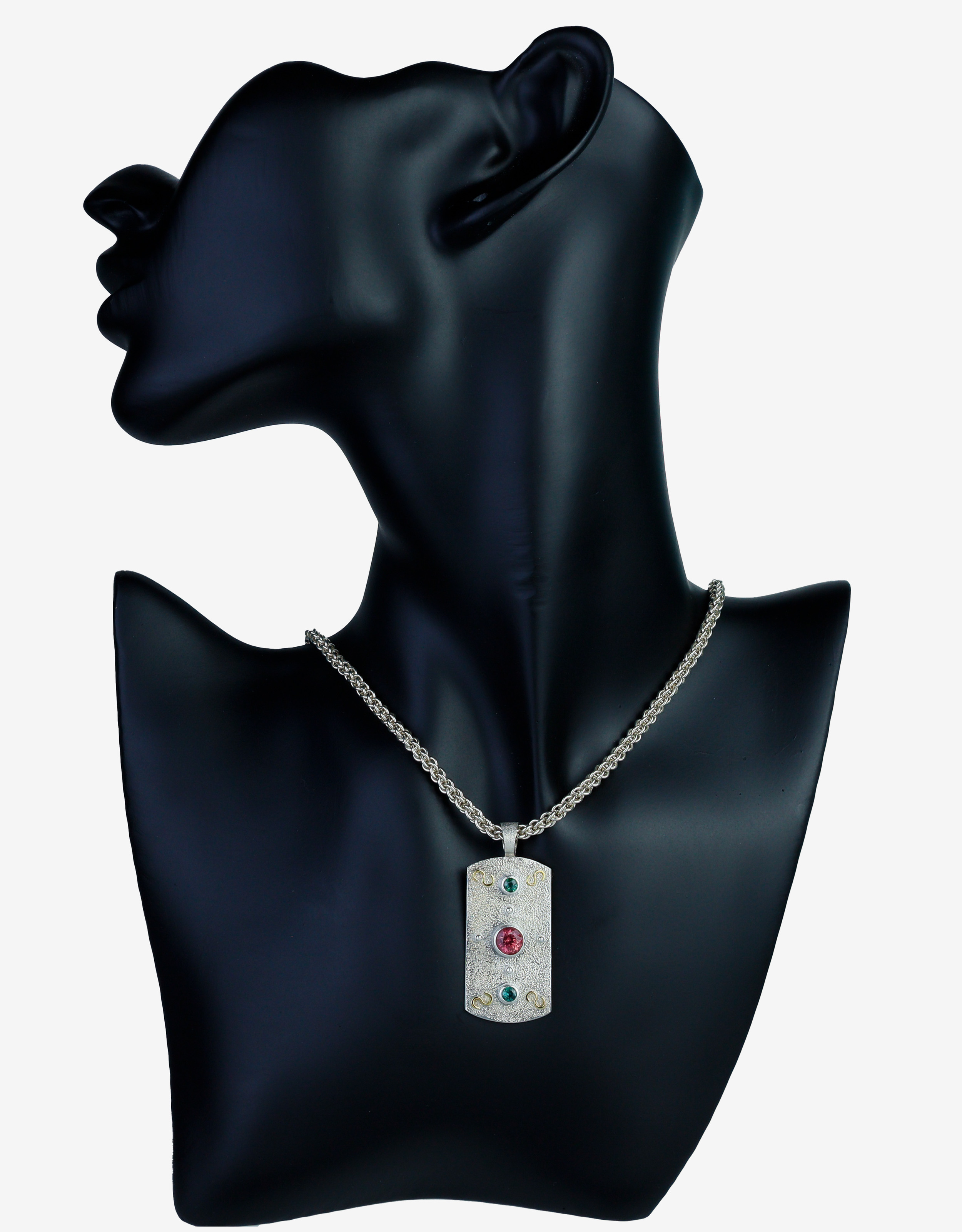 Silver gold and gemstone necklace.png