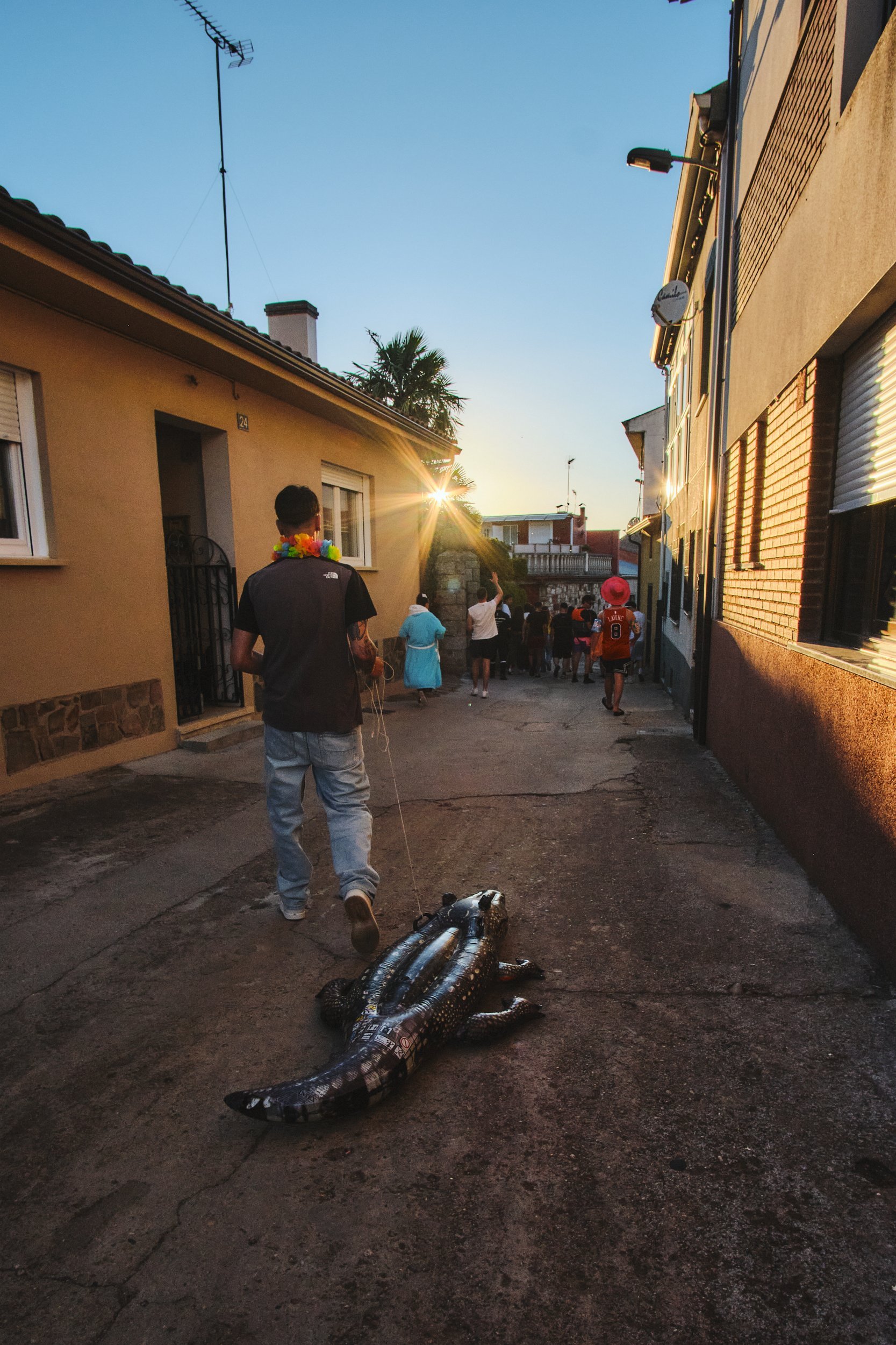Inflatable crocodile in the street during a village fiesta in Spain