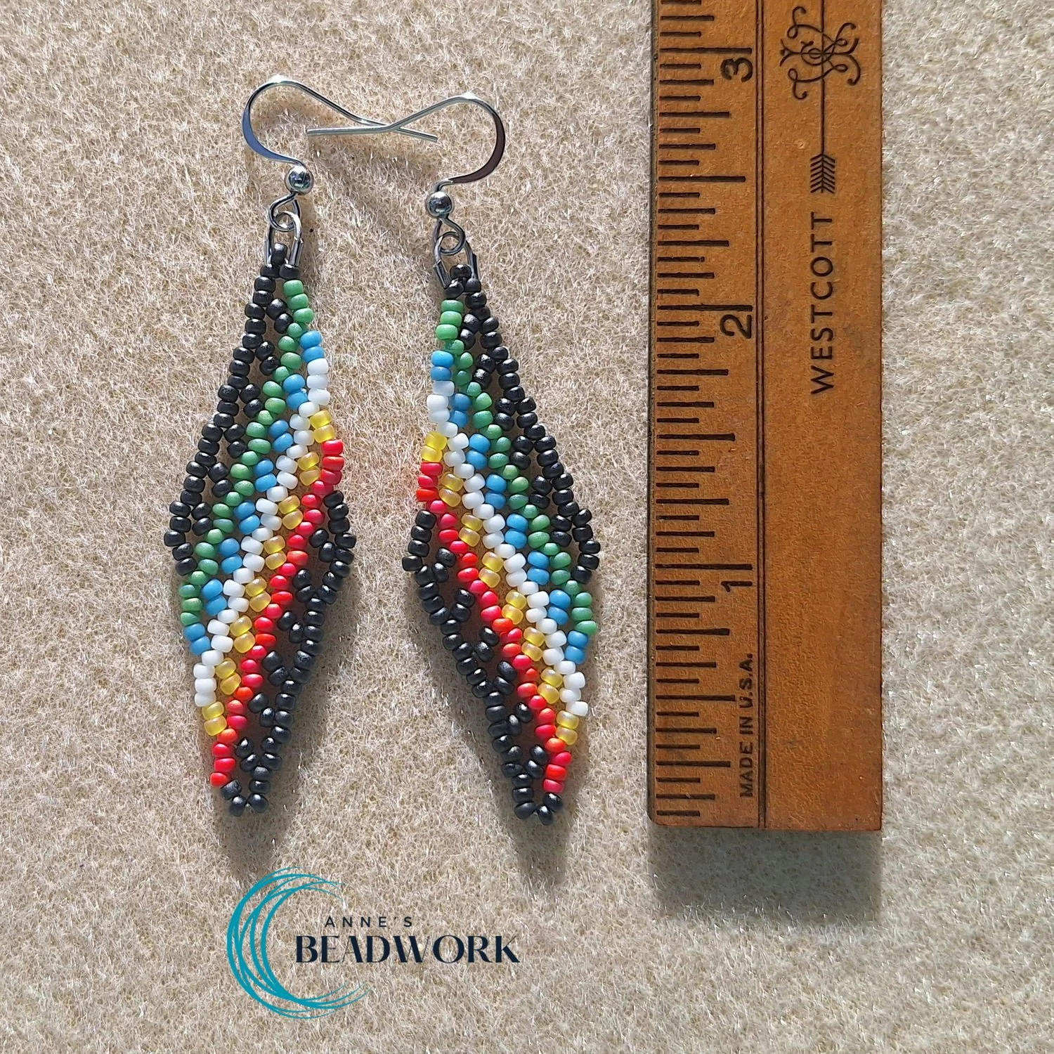 Feather_Earrings_Disability_Pride_Flag_Medium_20260331_Length.jpg