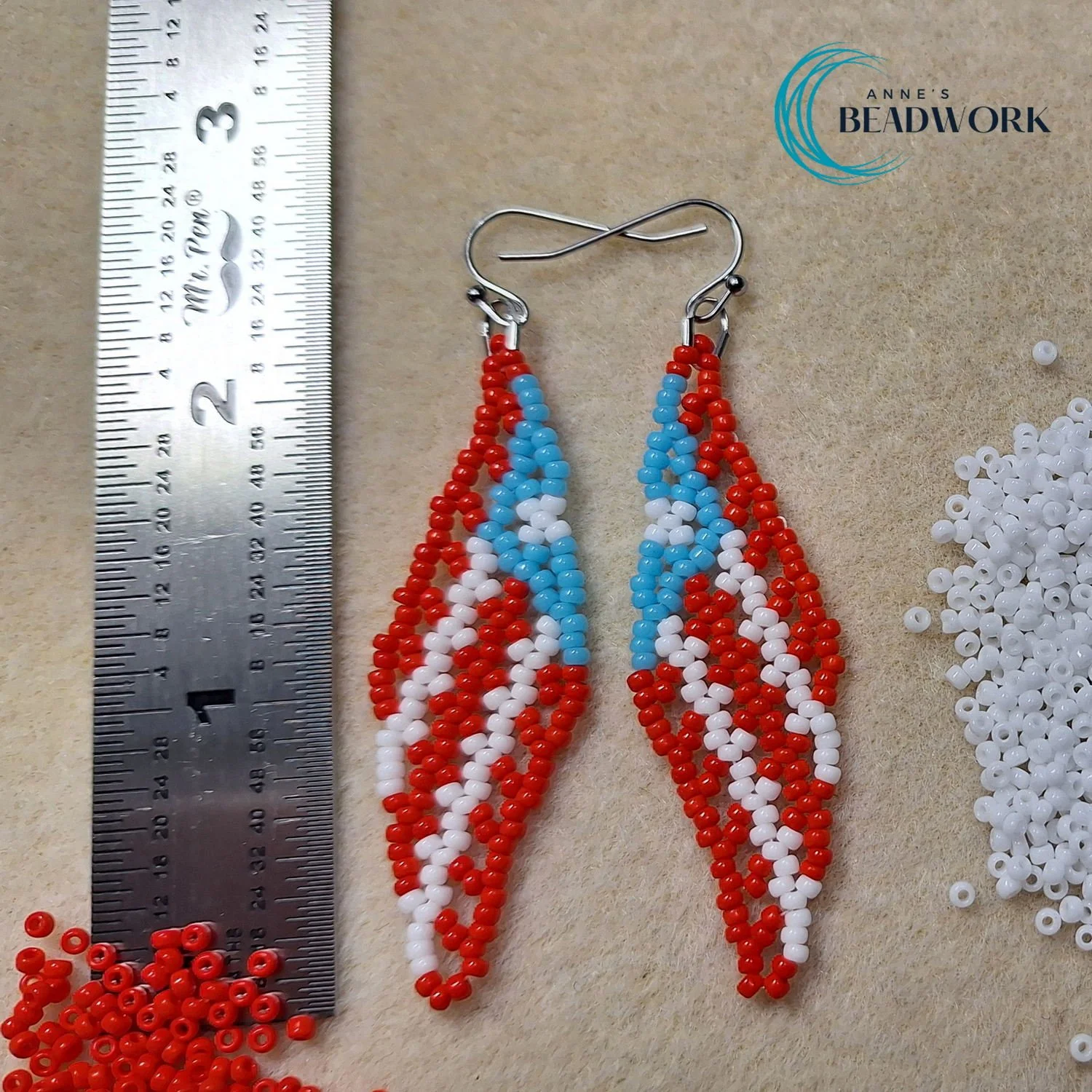 Feather_Earrings_Flag_Puerto_Rico_Light_Blue_Medium_20251126_Length.jpg