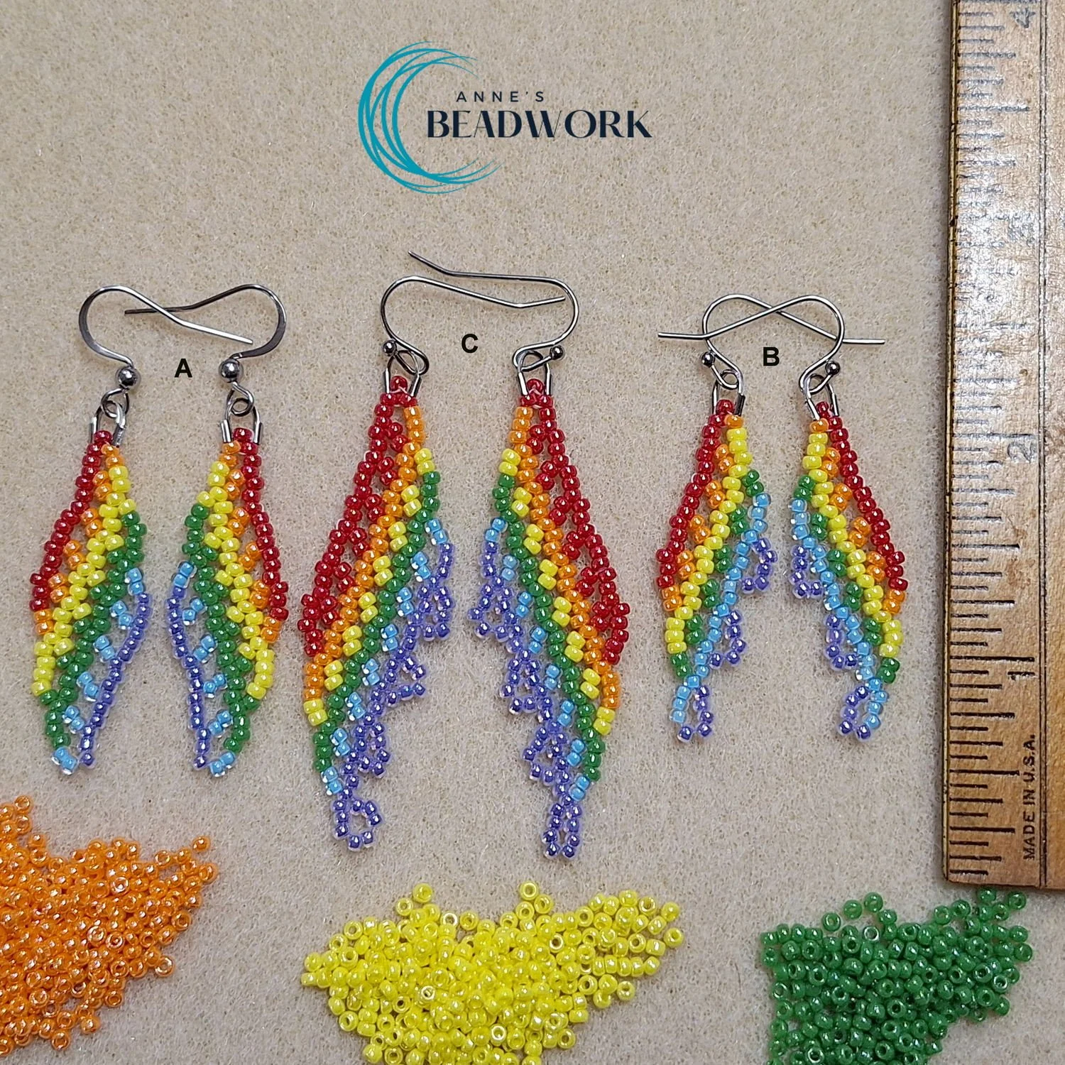 Feather_Earrings_Pride_Rainbow_Luster_Medium_Mini_20260323_Length.jpg