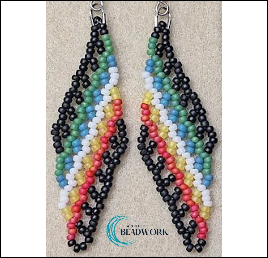 DIsability_Pride_Flag_Feather_Earring_20260223.jpg