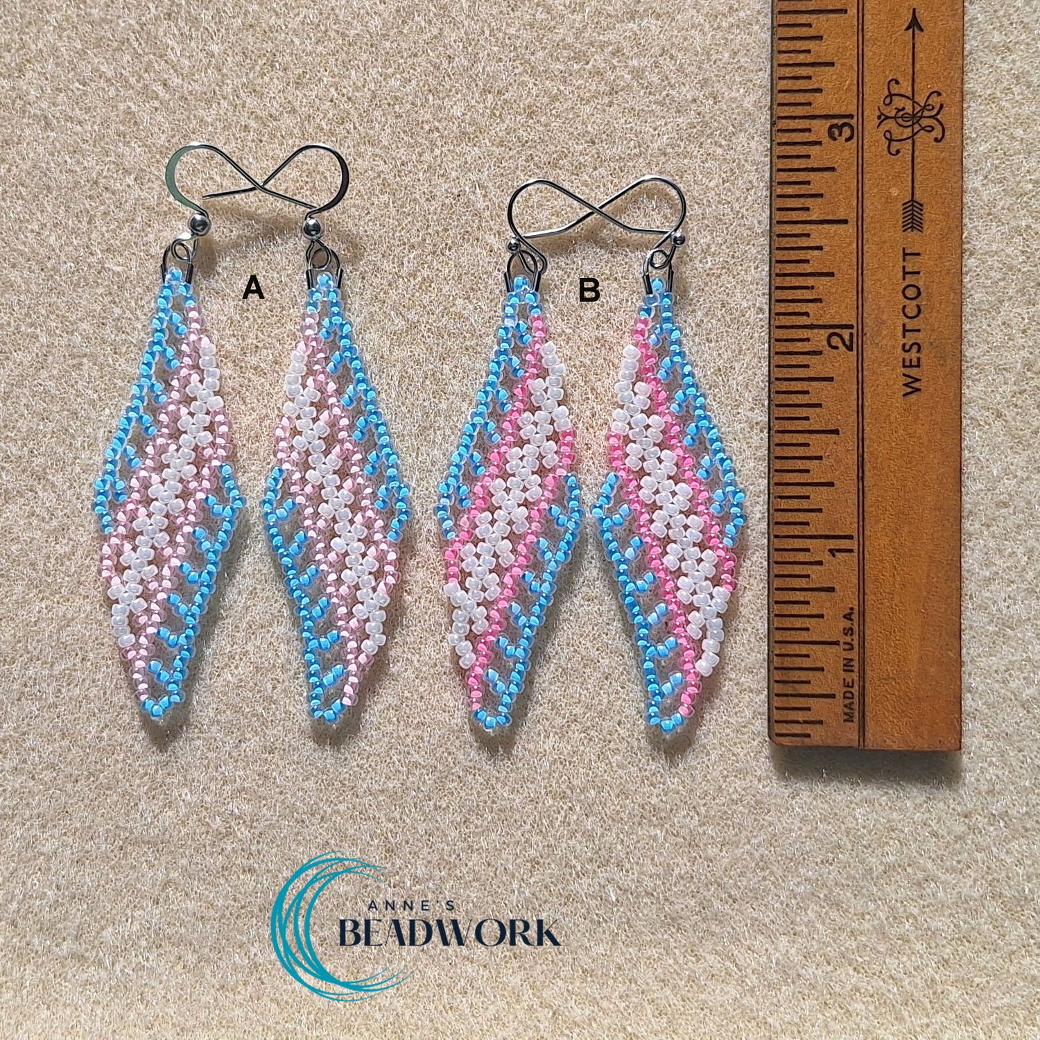Feather_Earrings_Pride_Transgender_Flag_Medium_20260331_Length.jpg