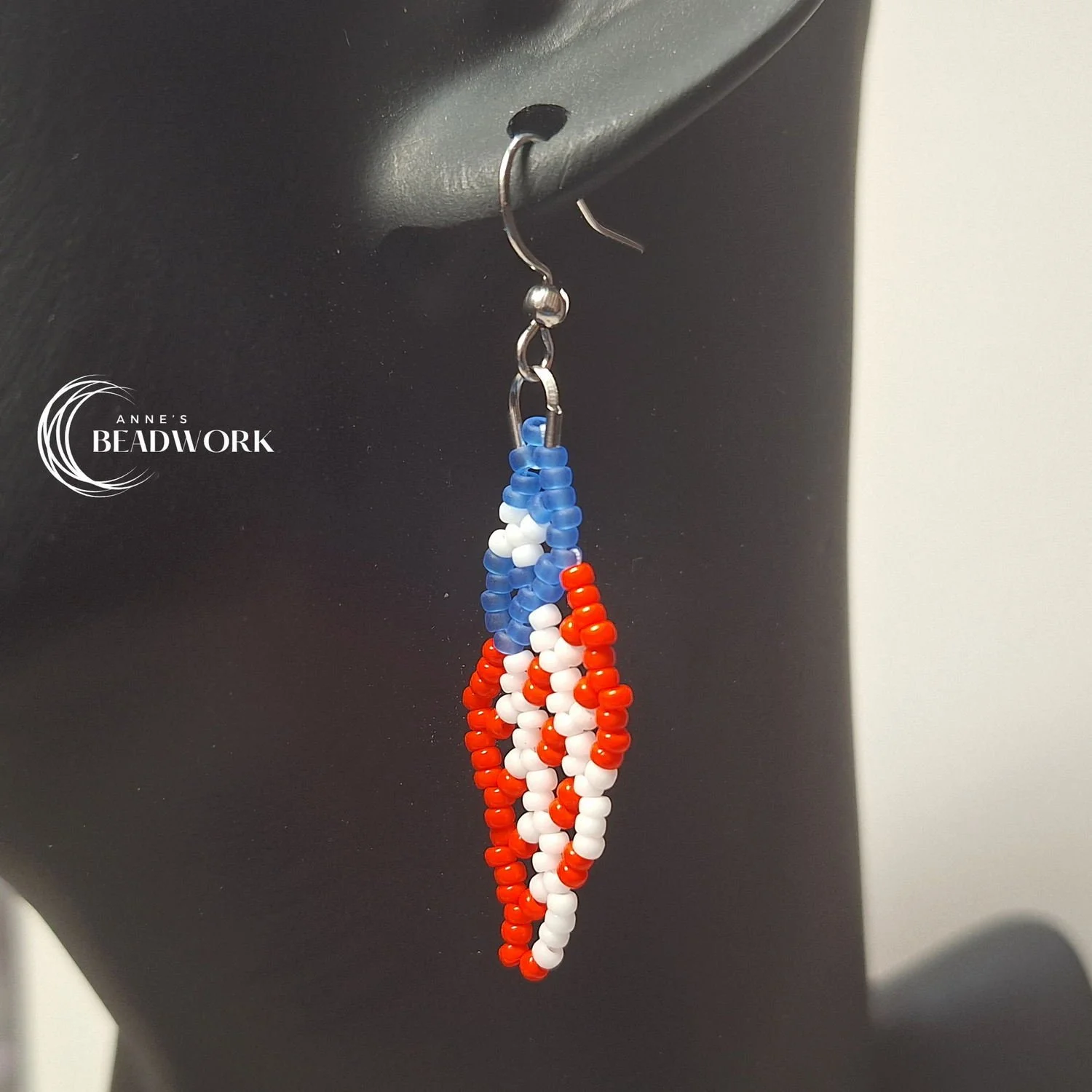 Feather_Earrings_Flags_Puerto_Rico_MediumBlue_Small_20260814_Hanging.jpg