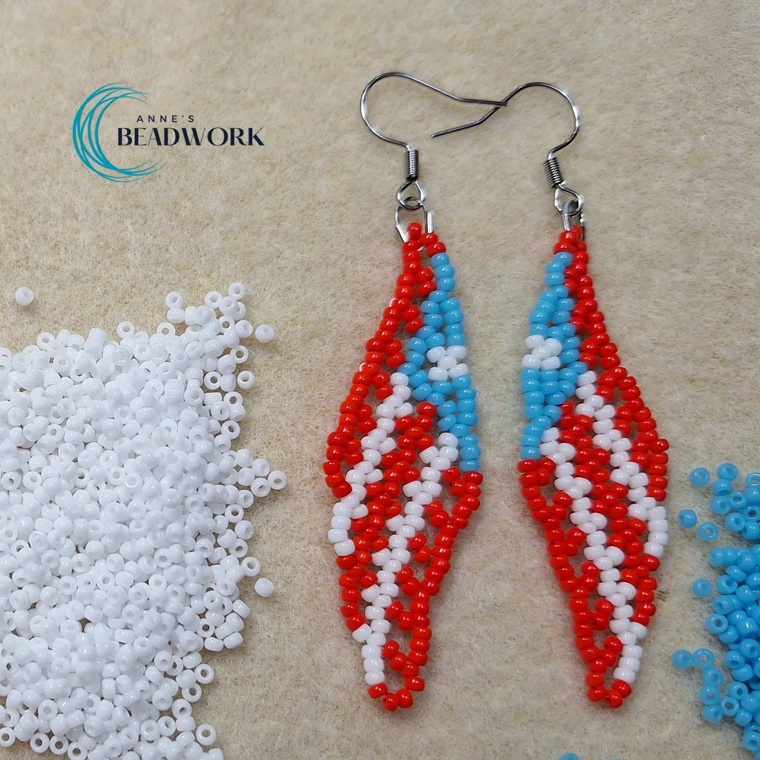 Feather_Earrings_Flag_Puerto_Rico_Light_Blue_Medium_20251126_1.jpg