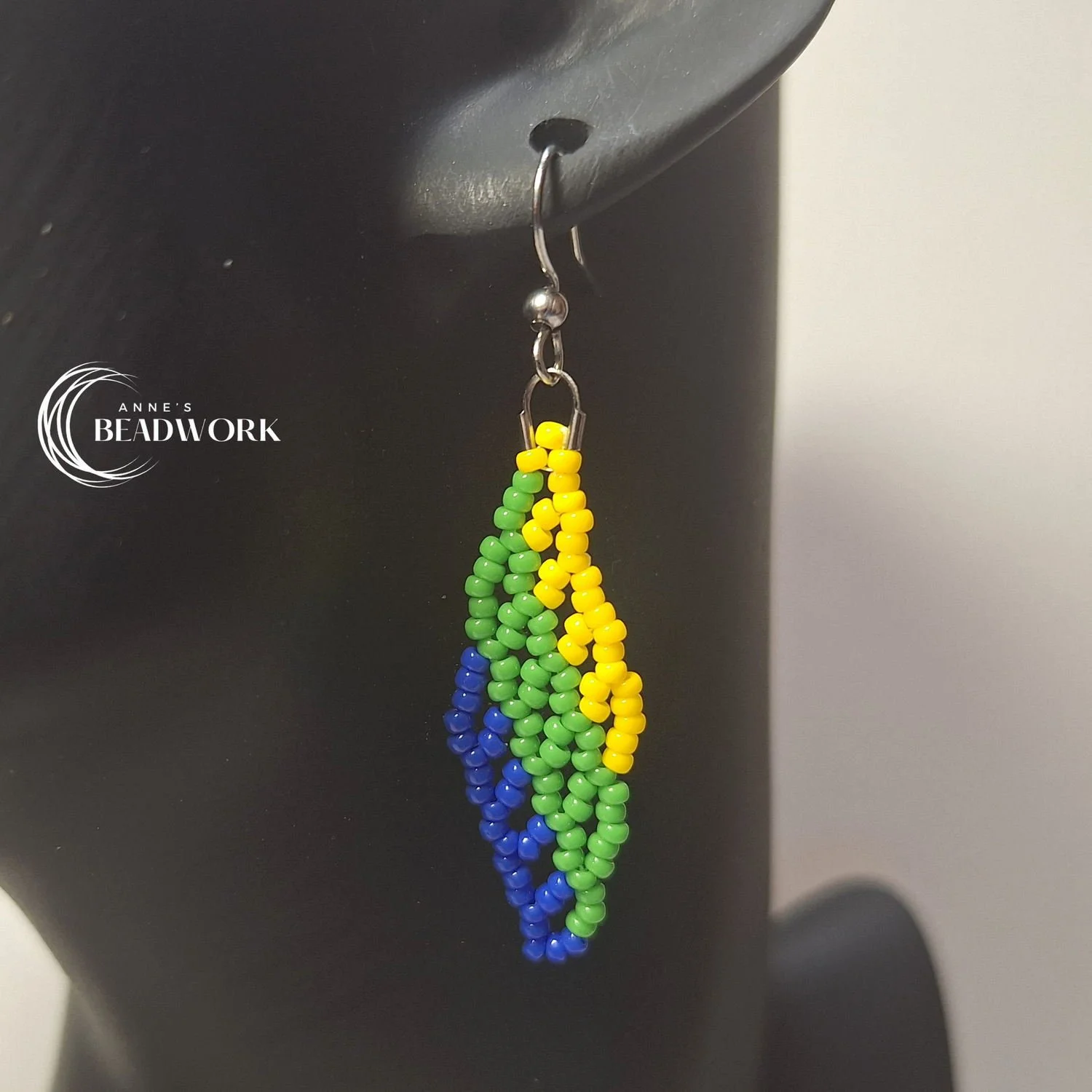 Feather_Earrings_Flags_Corozal_Small_20260814_Hanging.jpg