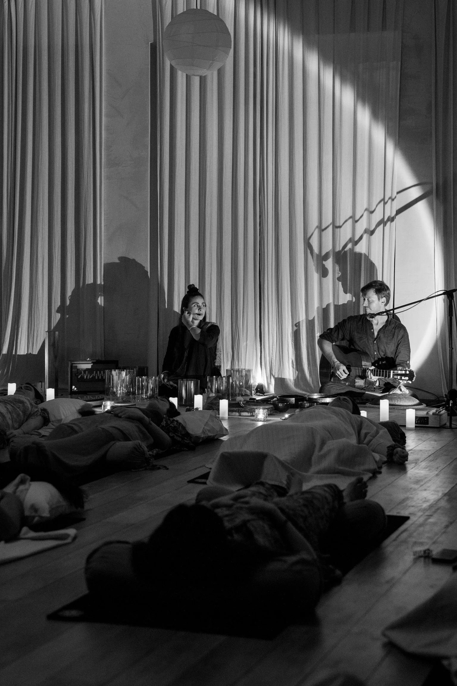 Group sound bath practice at the sound practitioner training