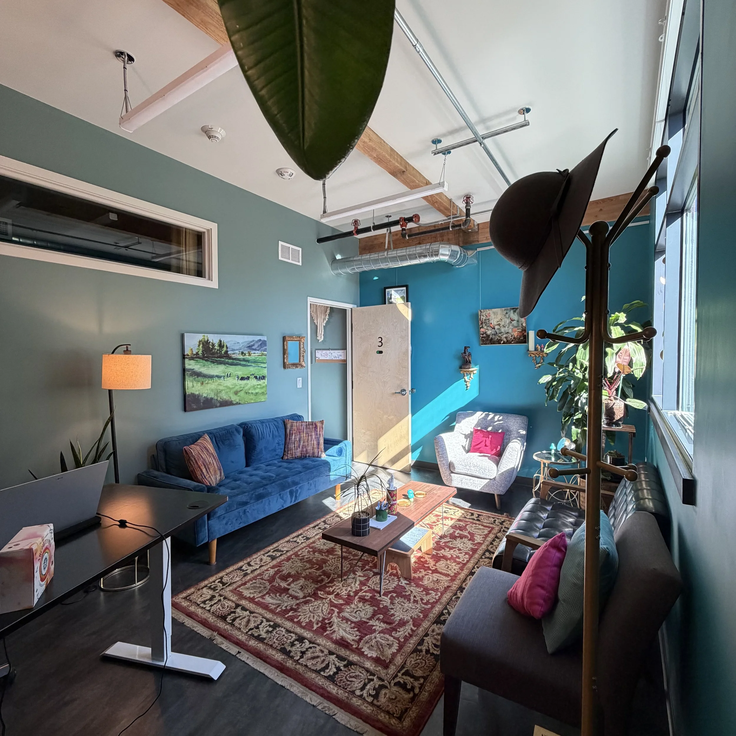 south room facing w coat rack hat.JPG