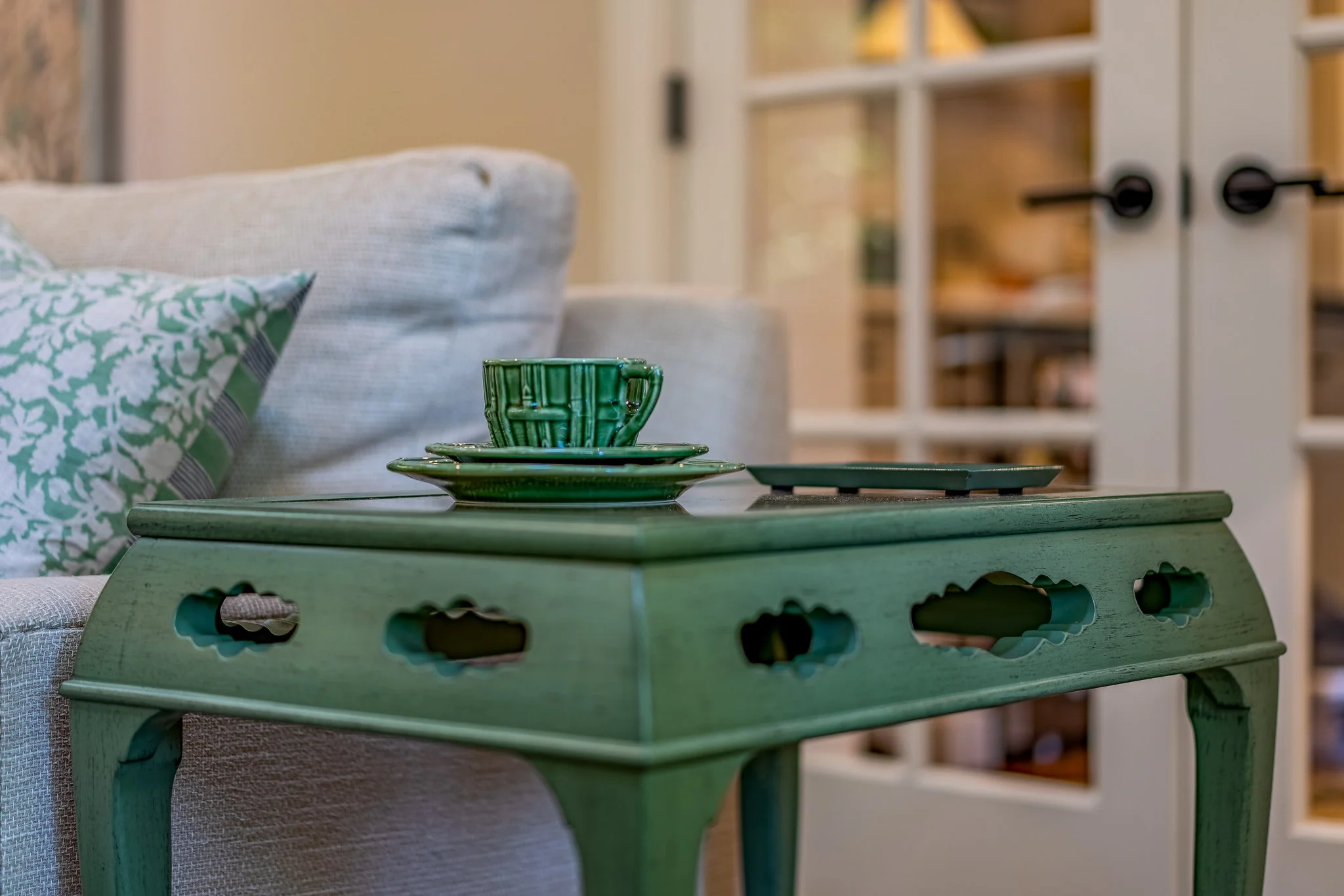 Custom emerald green side table with Chinese cloud motif design