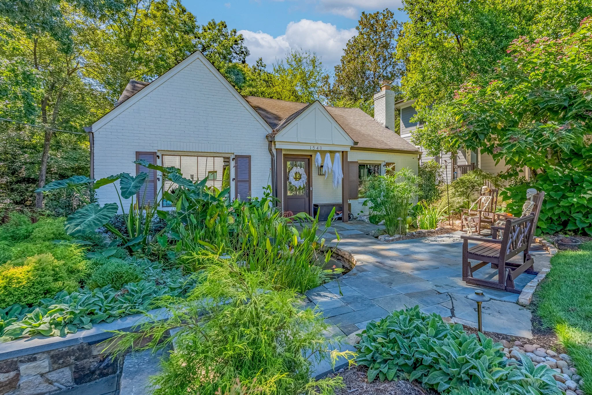 freedom park house with beautiful front yard pond
