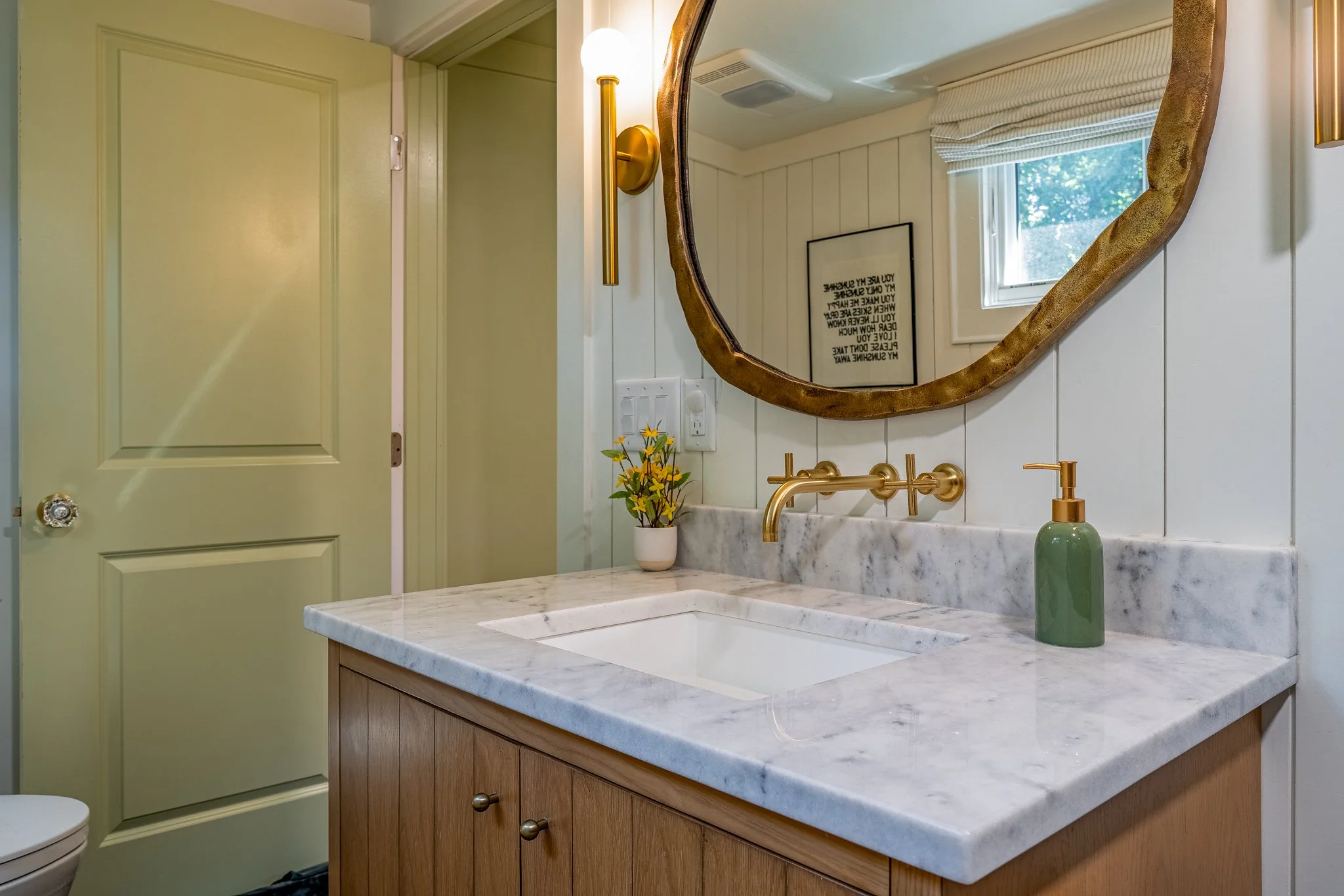 white oak vanity with marble countertop