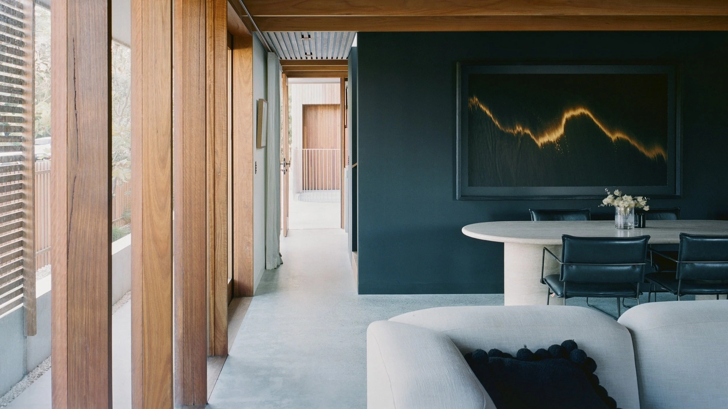 Polished concrete interior floor with honed concrete pool surround