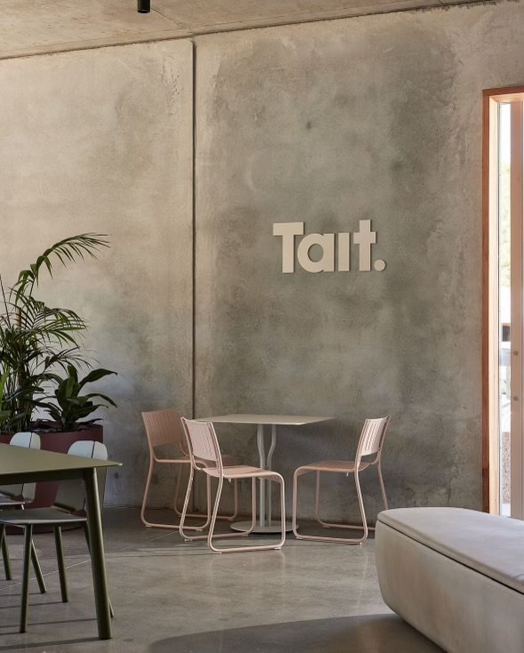 Lightly exposed polished concrete satin polish Tait showroom Byron Bay