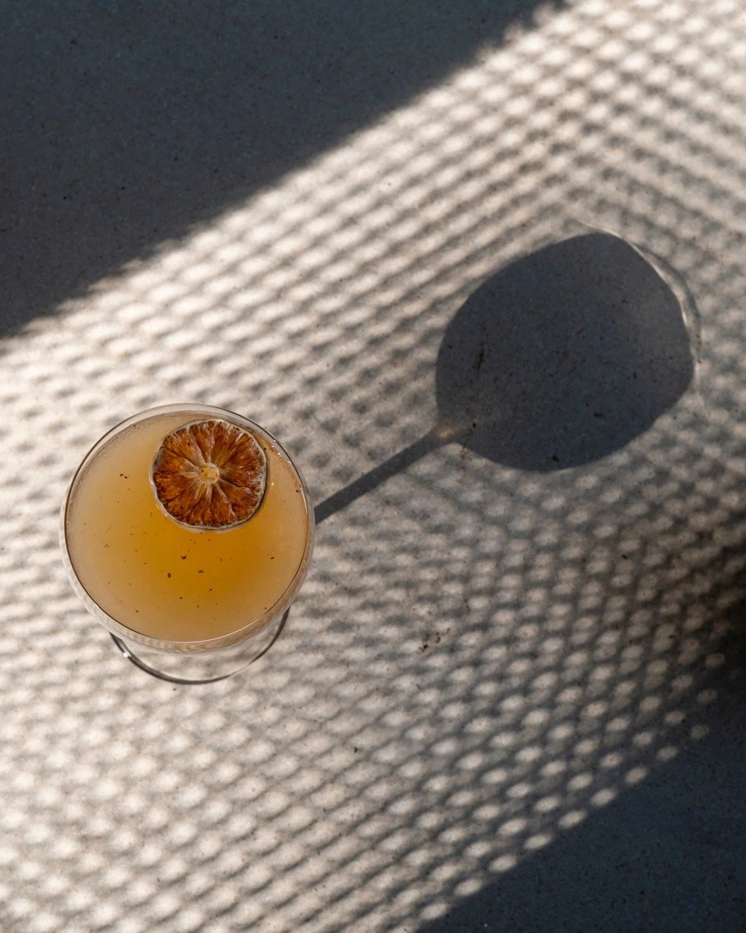 It greets you first with a warm, spiced aroma &mdash; nutmeg lifting gently above citrus brightness. The texture is silk on the tongue, a seamless blend of sweet red bean richness and the sharp clarity of lemon. As you sip, the flavors unfold slowly,