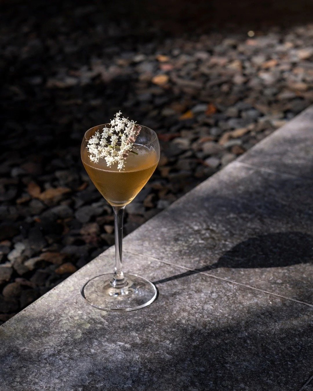 The nutty sweetness of shochu meets the delicate acidity of umeshu, lifted by the soft scent of chamomile and the quiet smoke of sage. The finish is long, serene, and grounding &mdash; a reminder to pause, breathe, and begin again.

Each sip of REBIR