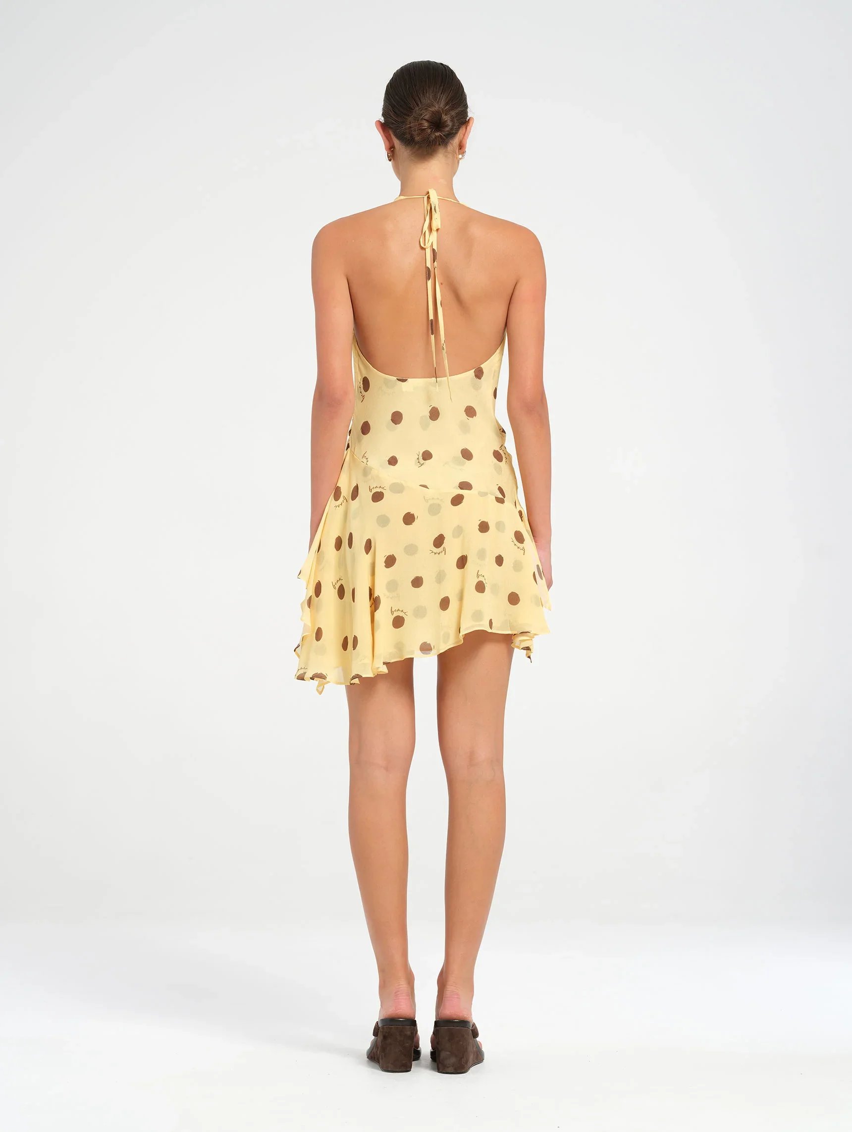 BEN345-WEBRES_1720x2284_WhynterVanravenstein_HarlowHalterMiniDress_ButterSpot-3.jpg.webp