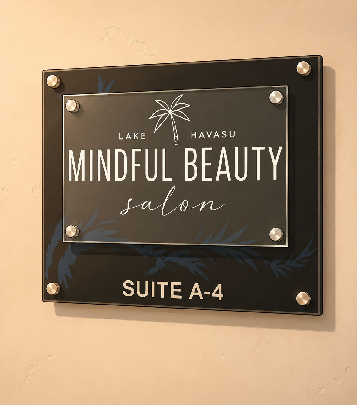 Sign for Mindful Beauty Salon, located in Suite A-4, with a palm tree graphic and decorative leaves.