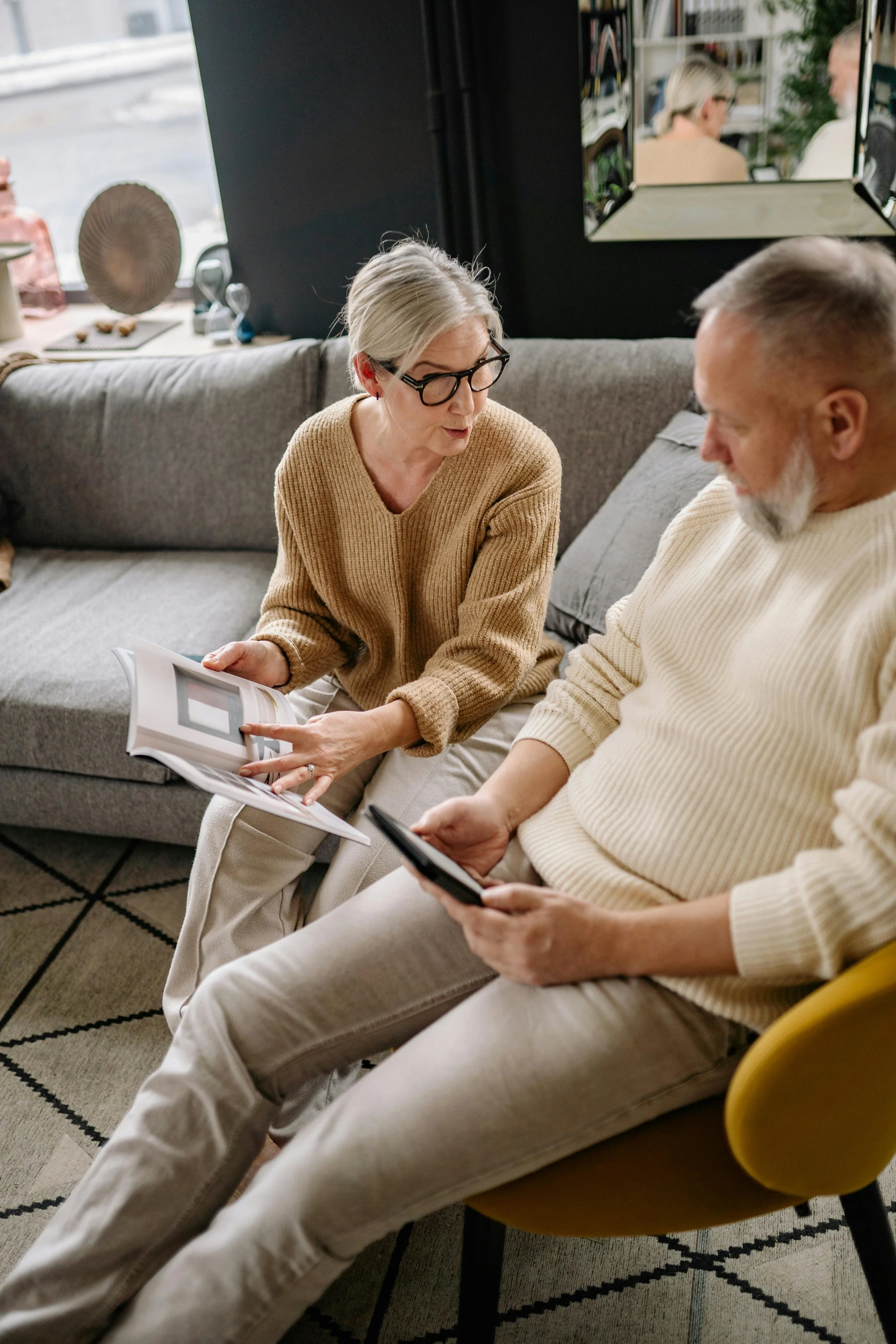 Older couple reviewing estate planning documents with a Sydney lawyer