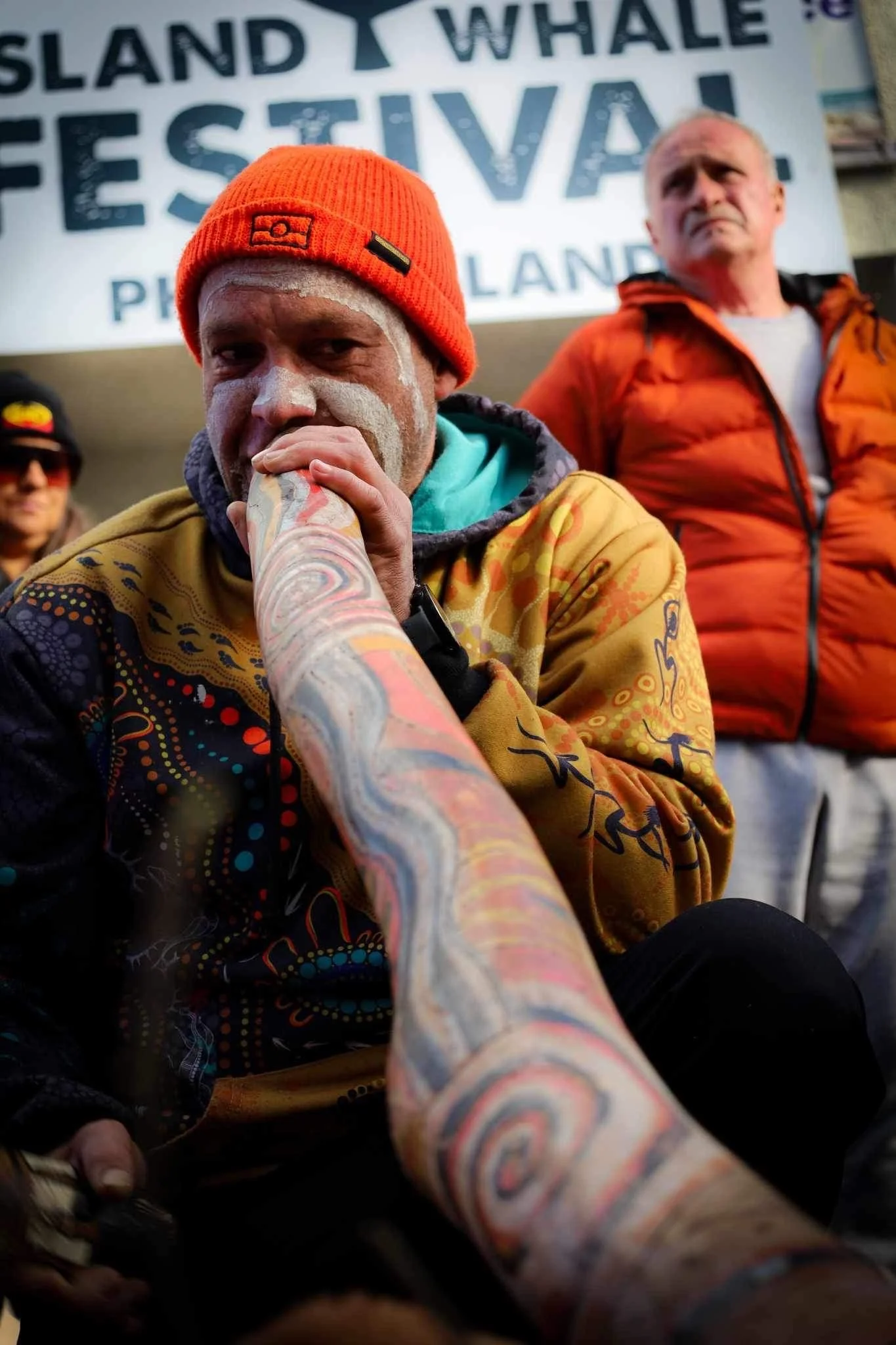 A yarning mat with possum skins, Aboriginal Country maps, and cultural artefacts