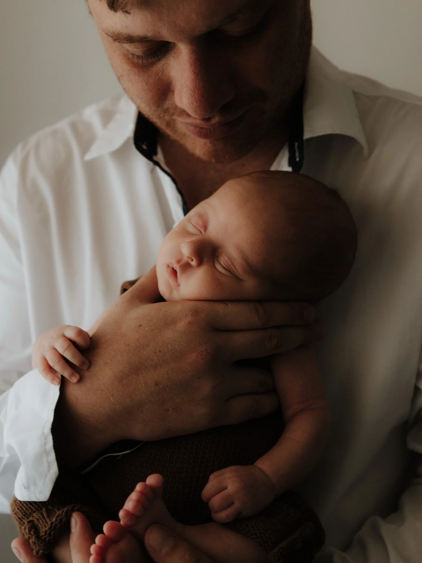 Dad holds his whole world in his hands 🥹