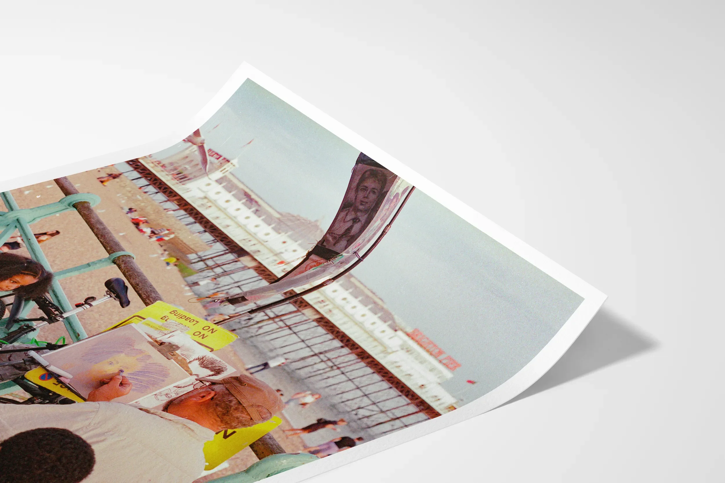 Bright Pier Caricature Artist © Surf Coast Photography Prints-32_PORTRAIT_PAPER_MOCKUP_CURL.webp