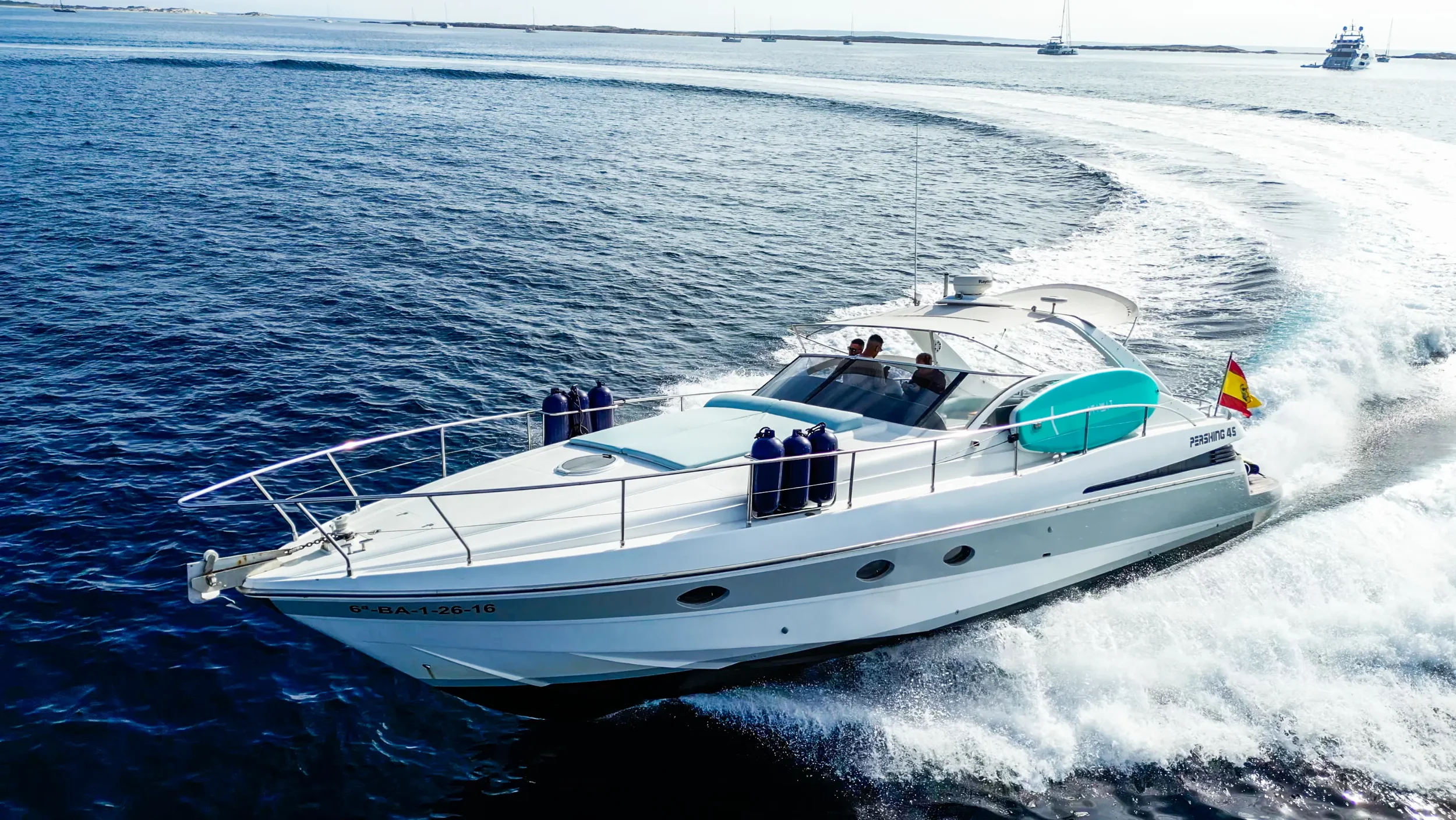 Pershing 45 Nona deck view while cruising smoothly across calm Mediterranean water