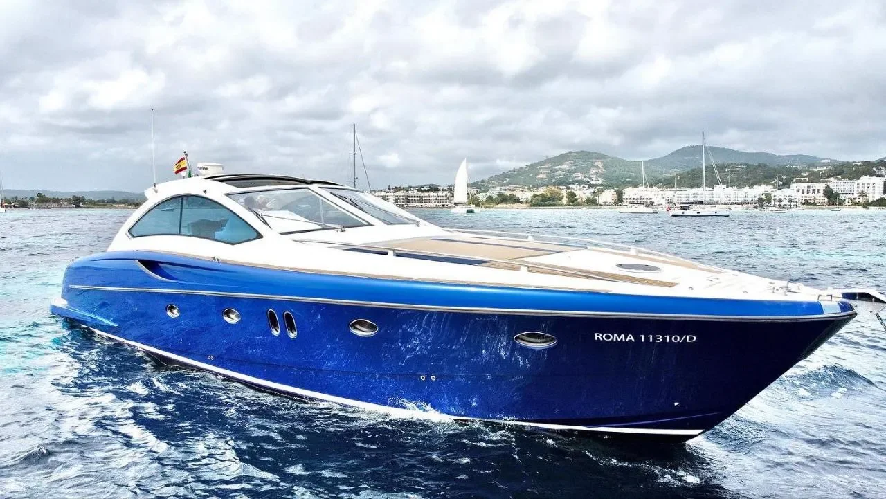 Numarine 55 Bewitched side profile underway showing sleek exterior lines