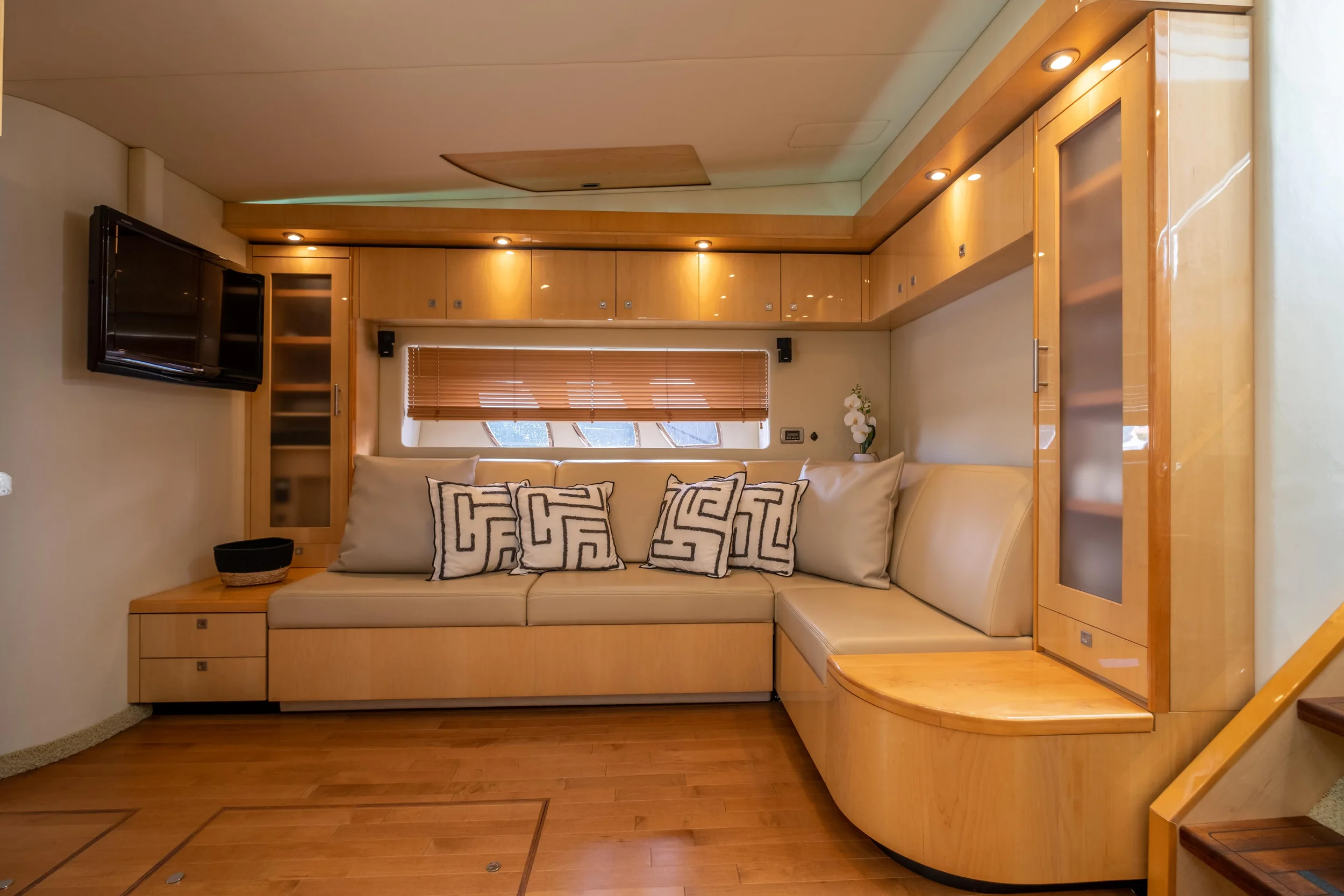 Sea Ray 55 Il Consigliere interior galley with wood finishes and comfortable seating