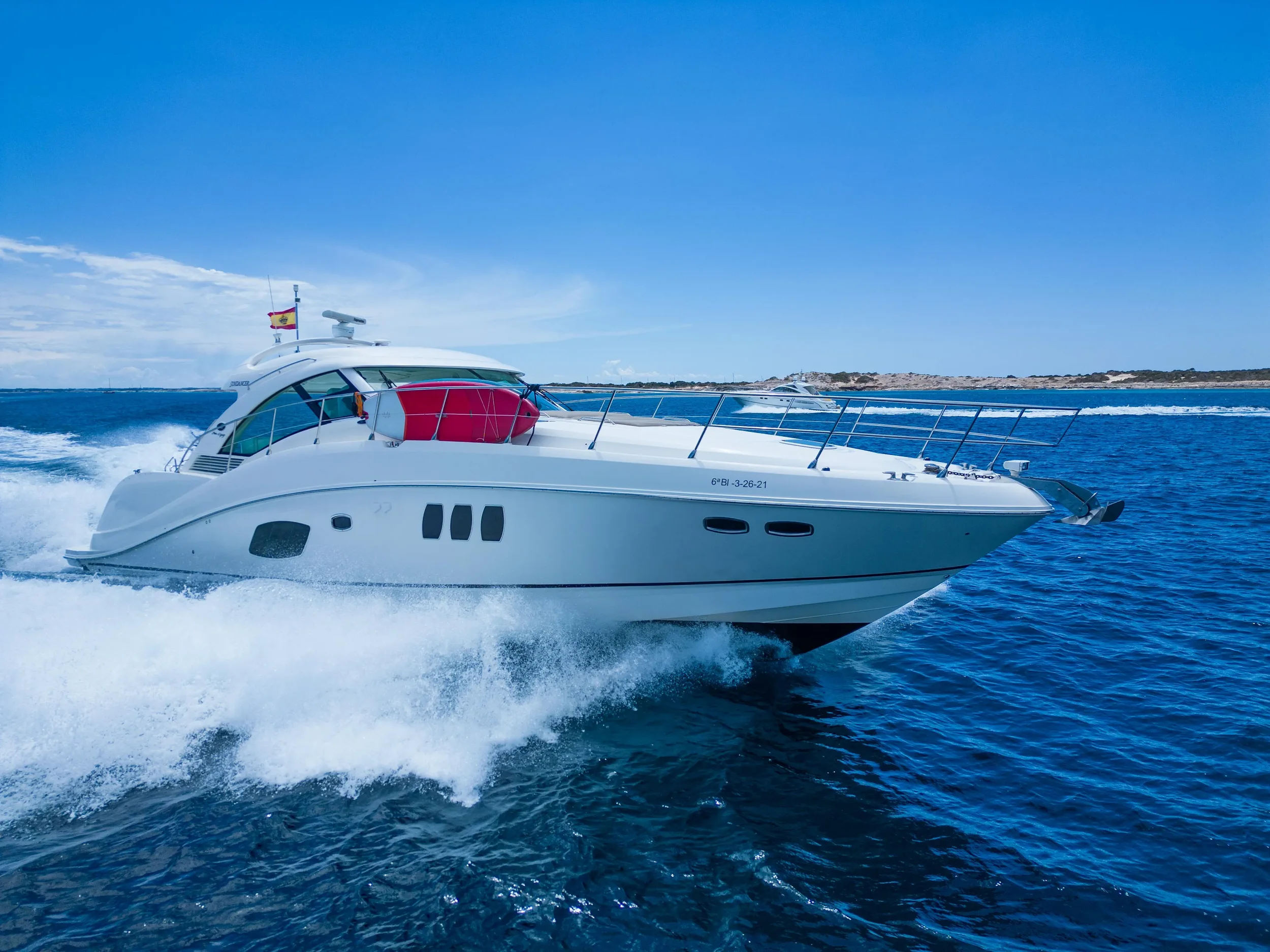 Sea Ray 55 Il Consigliere moving at speed over deep blue Mediterranean water