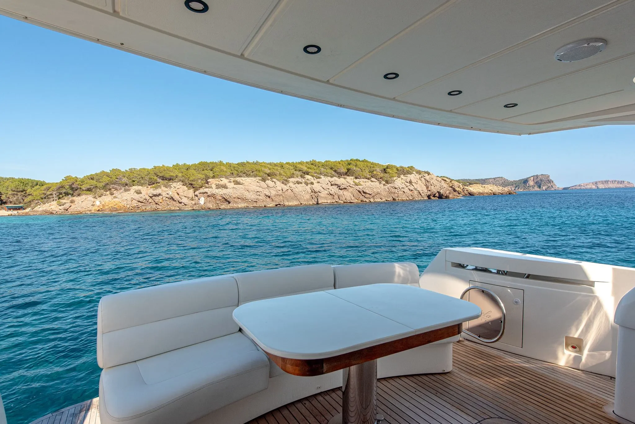 Abacus 61 Estela exterior dining area with sea views from the aft deck