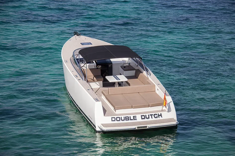 VanDutch 40 viewed from above showing wide aft sunbed while anchored in clear turquoise water