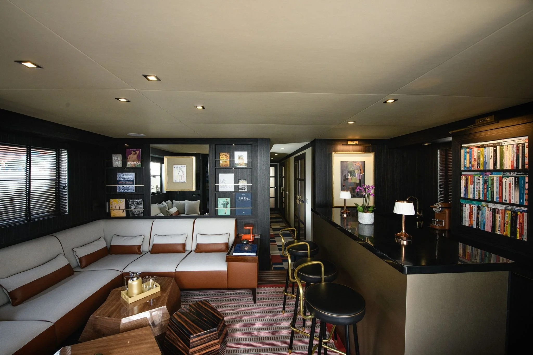 luxurious yacht interior with seating area and bar