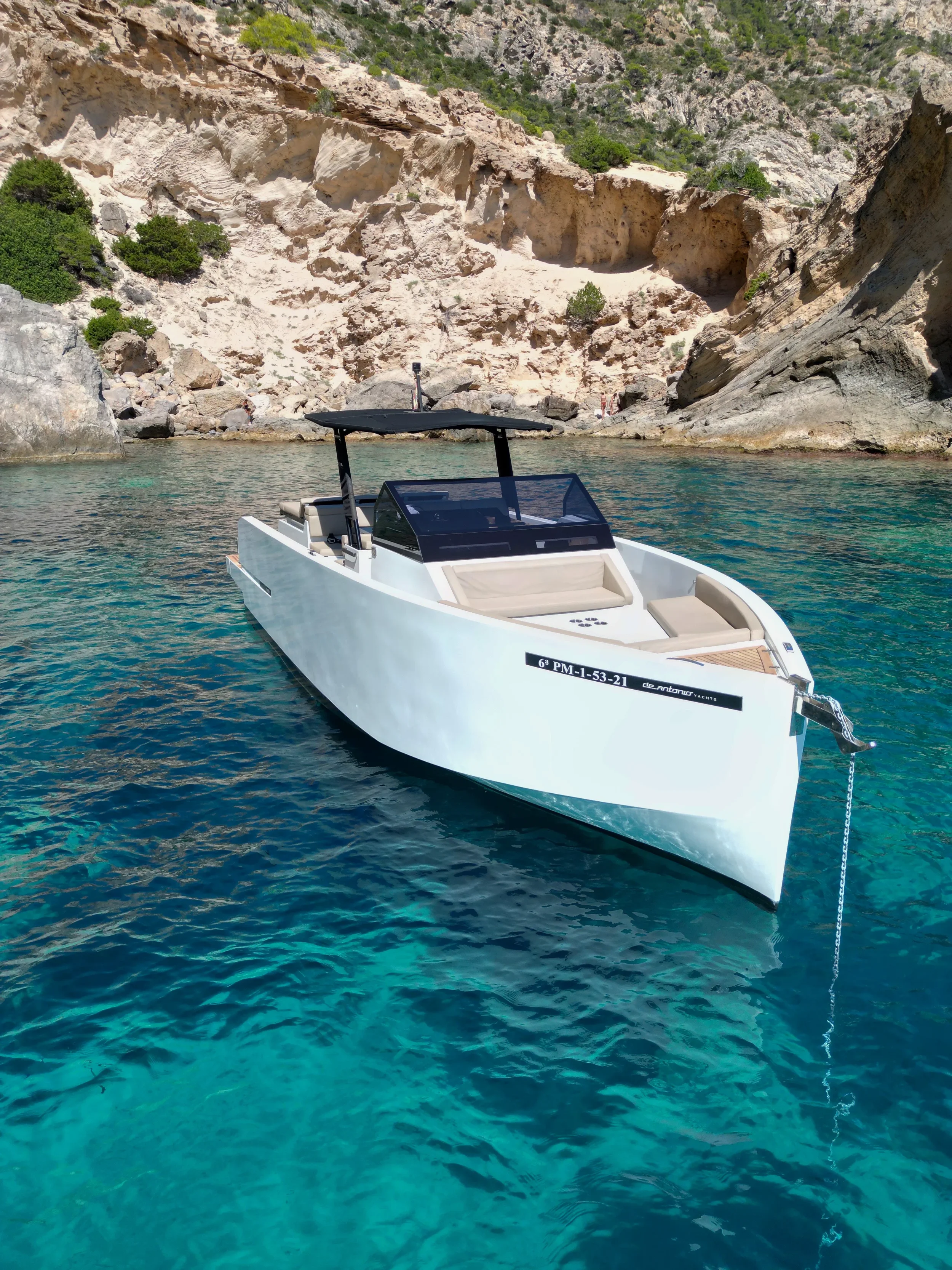 De Antonio 34 Gogga front angle showing walk-around deck and sunbeds