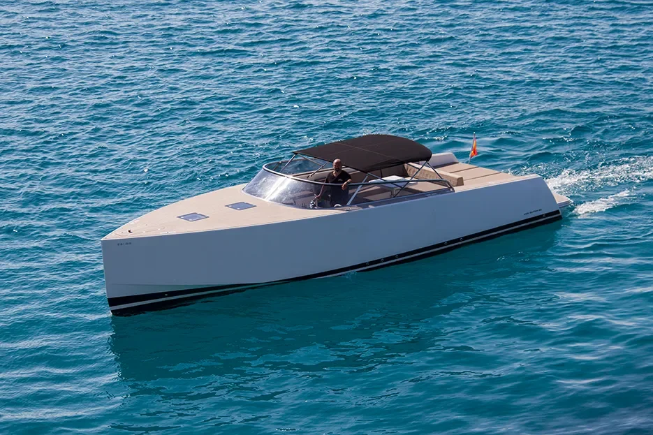 VanDutch 40 underway on calm water highlighting open deck and sunbathing areas