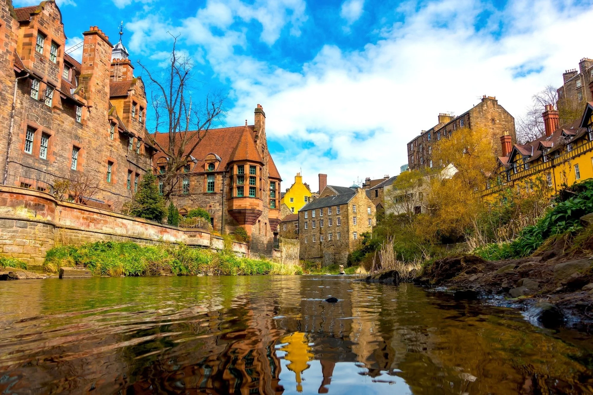 The Dean Village Tour with David Wheater. The Water of Leith running through the Dean Village in Edinburgh, Scotland.jpg