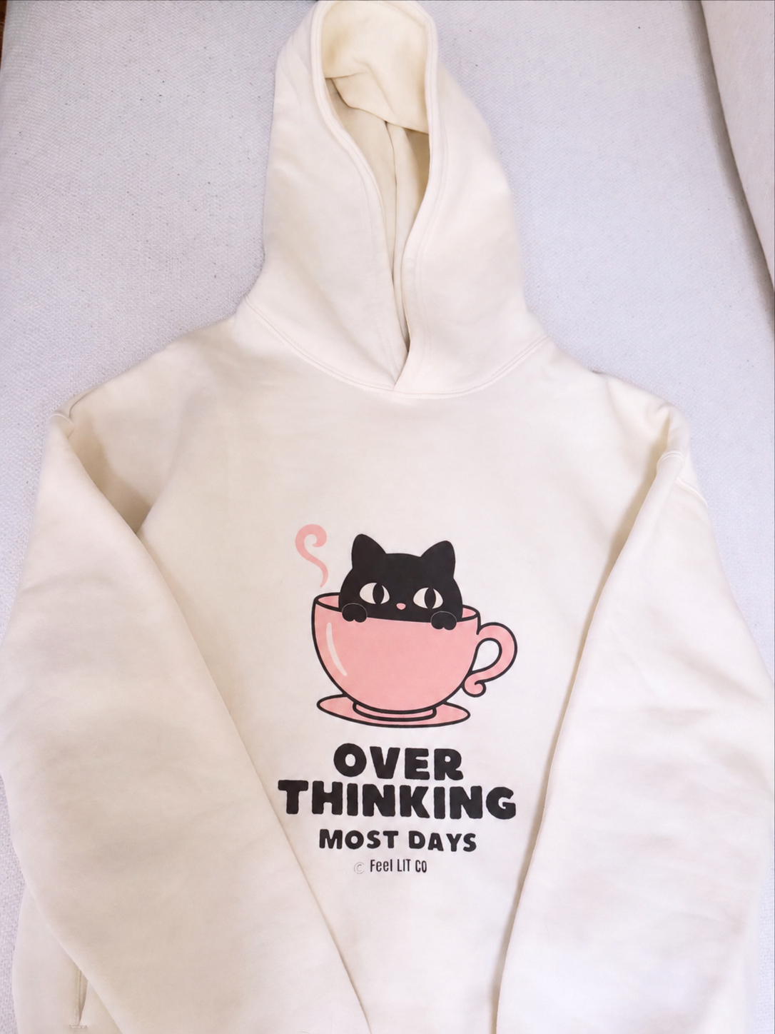 cream hoodie flat.png