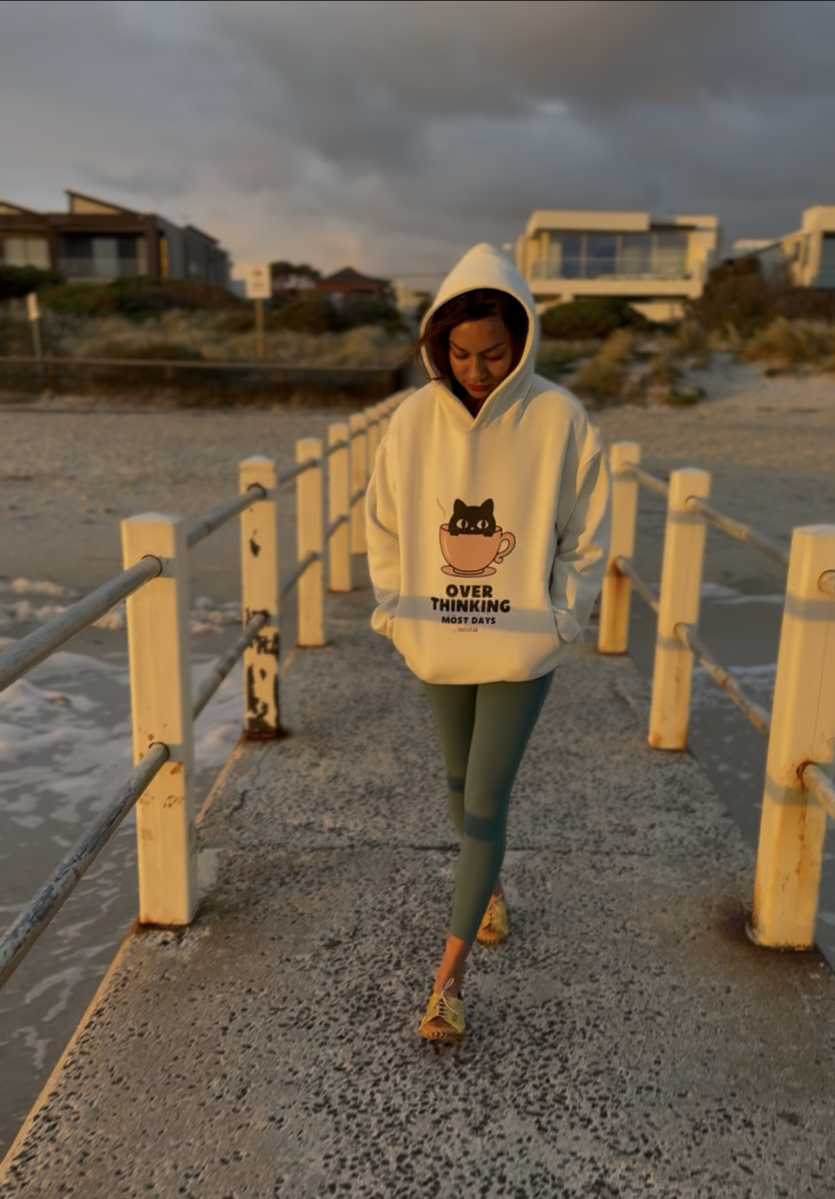 cream hoodie walking.png