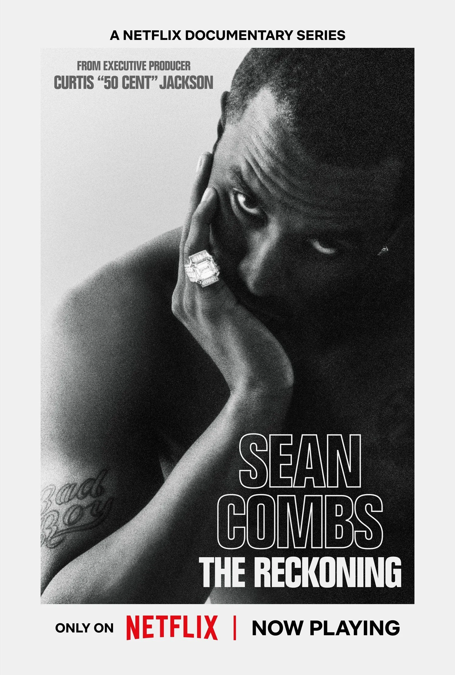 P Diddy staring into the camera with text that reads 'A Netflix Documentary Series' by Curtis '50 Cent' Jackson: Sean Combs: The Reckoning