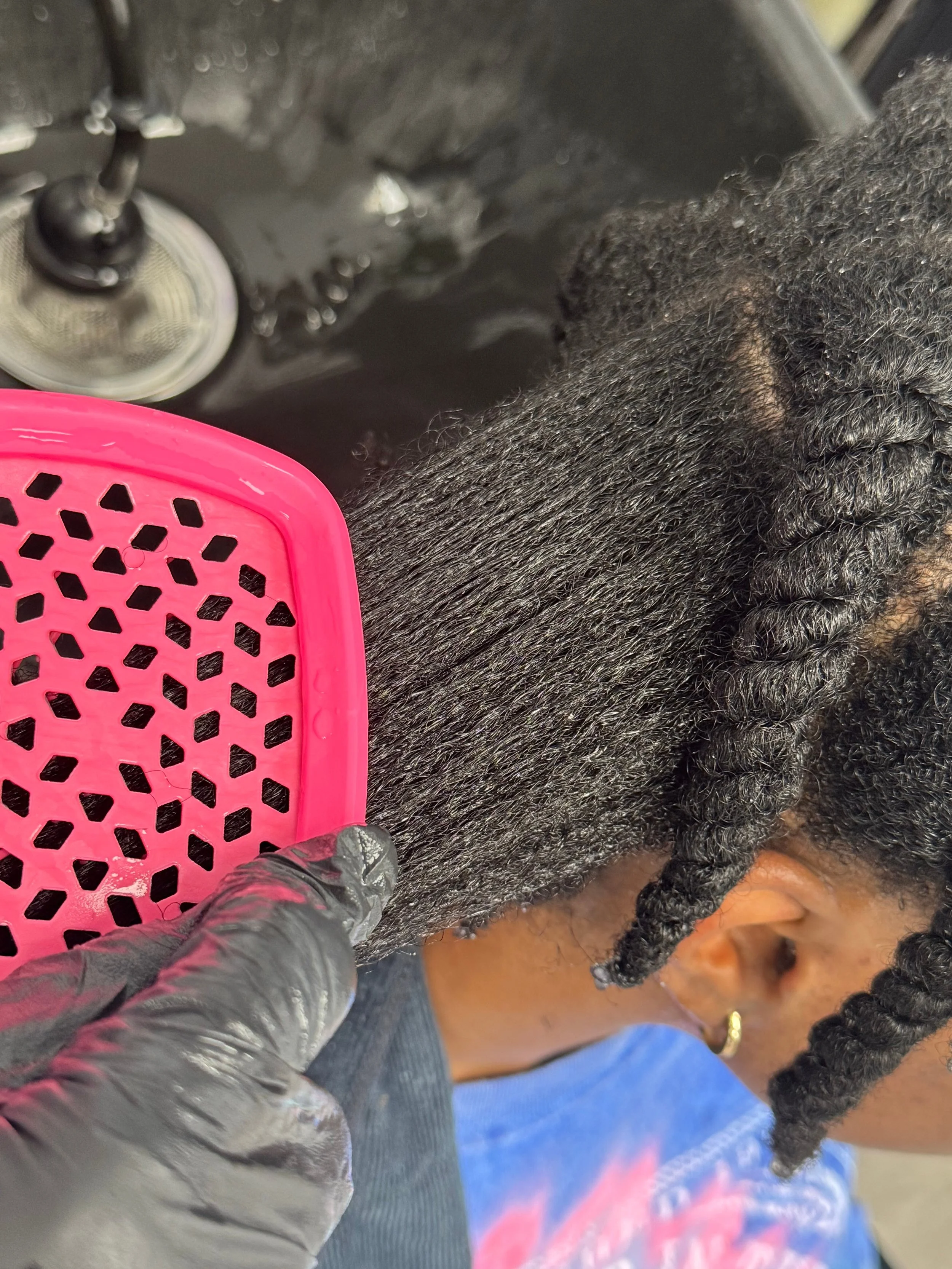 A brush coming natural hair