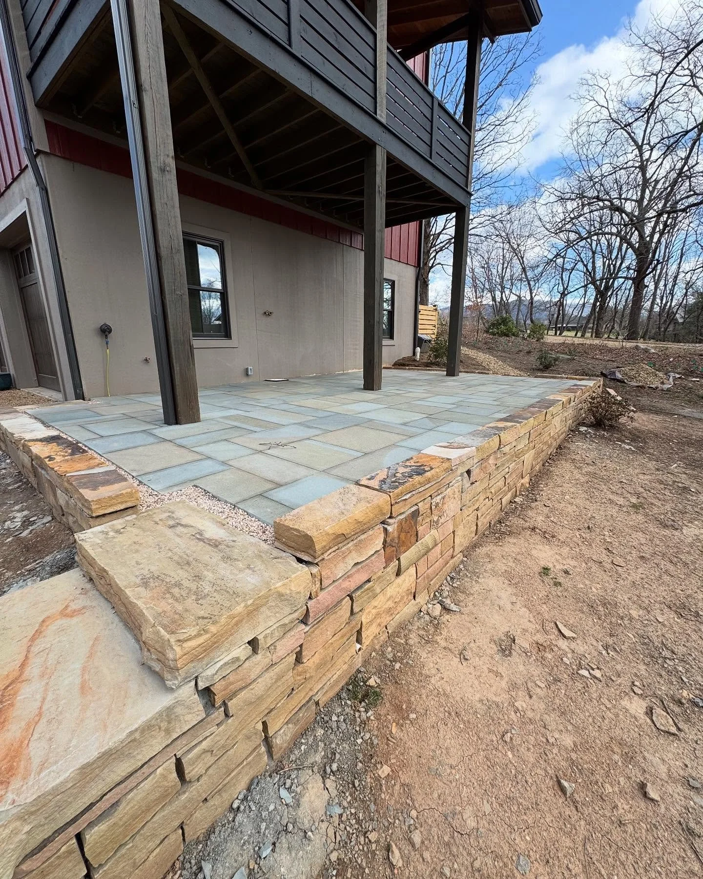 Paver patio with stacked pavers wall.jpg