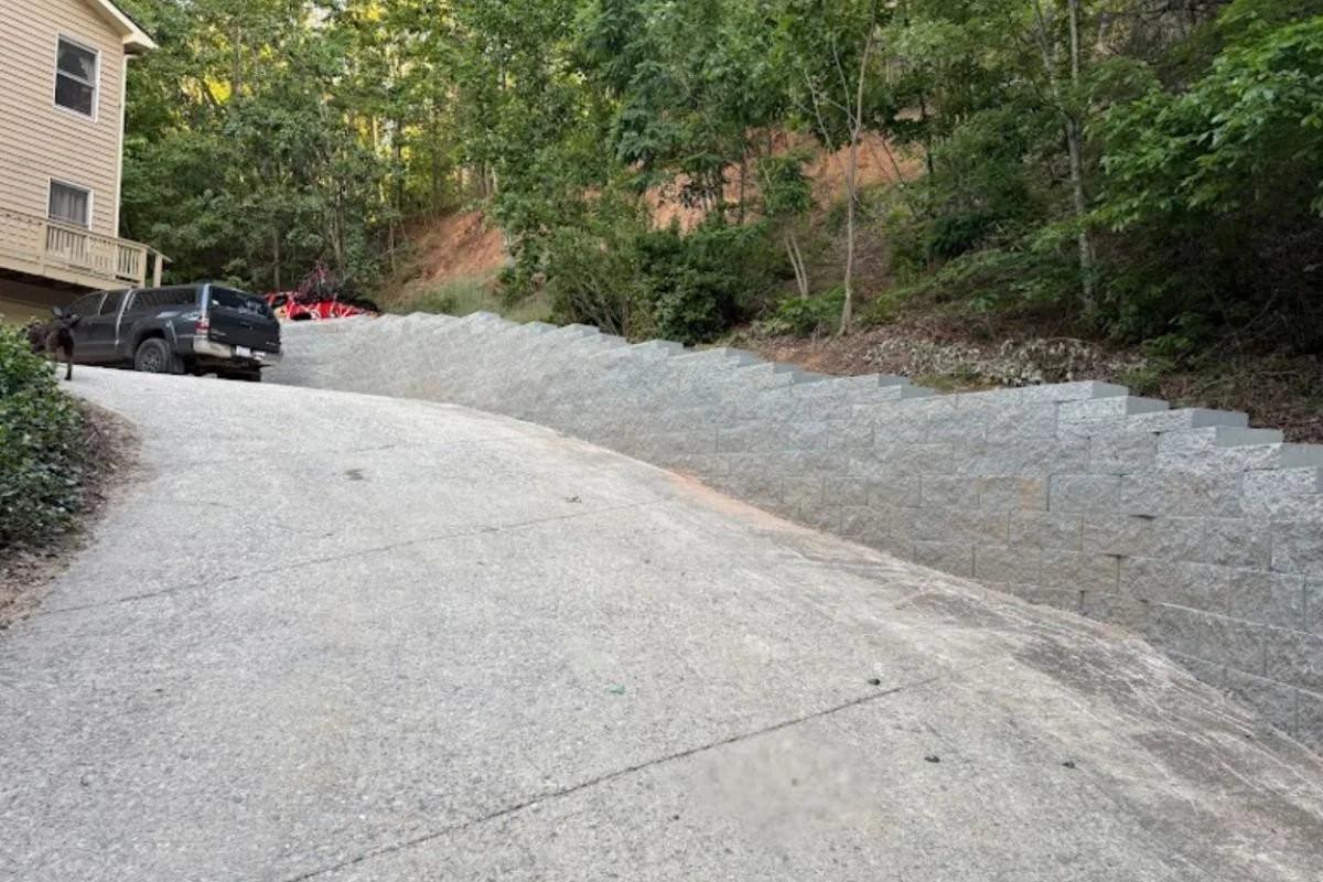 Engineered block retaining wall installed to stabilize hillside landscape in Montreat North Carolina