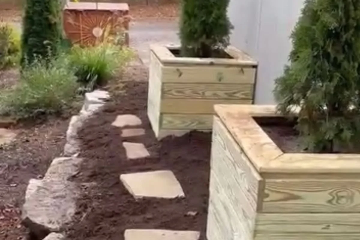 Custom timber retaining wall planter boxes with landscaping in Swannanoa North Carolina