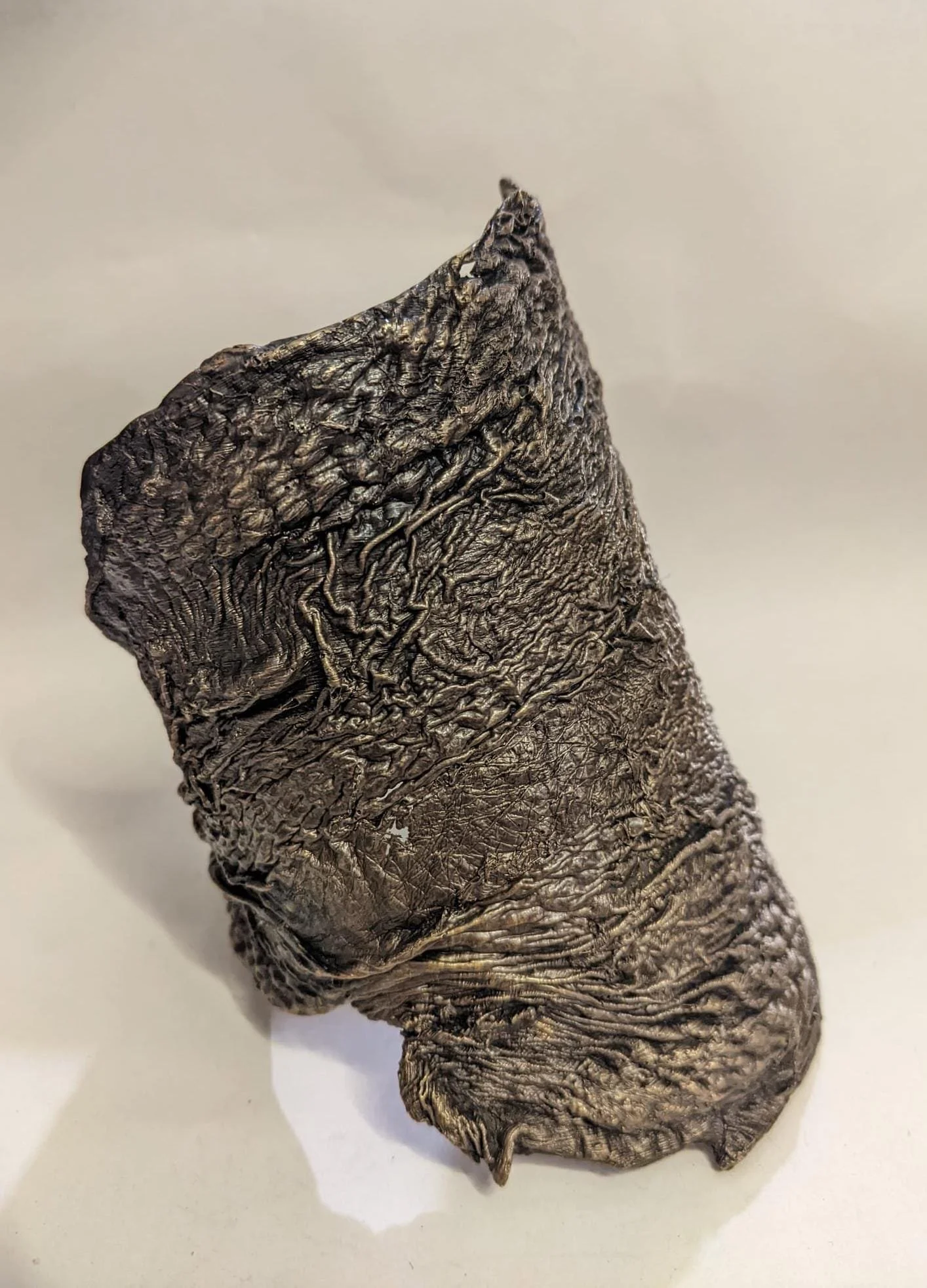 Chicken skin cuff, 2024. Bronze casting
