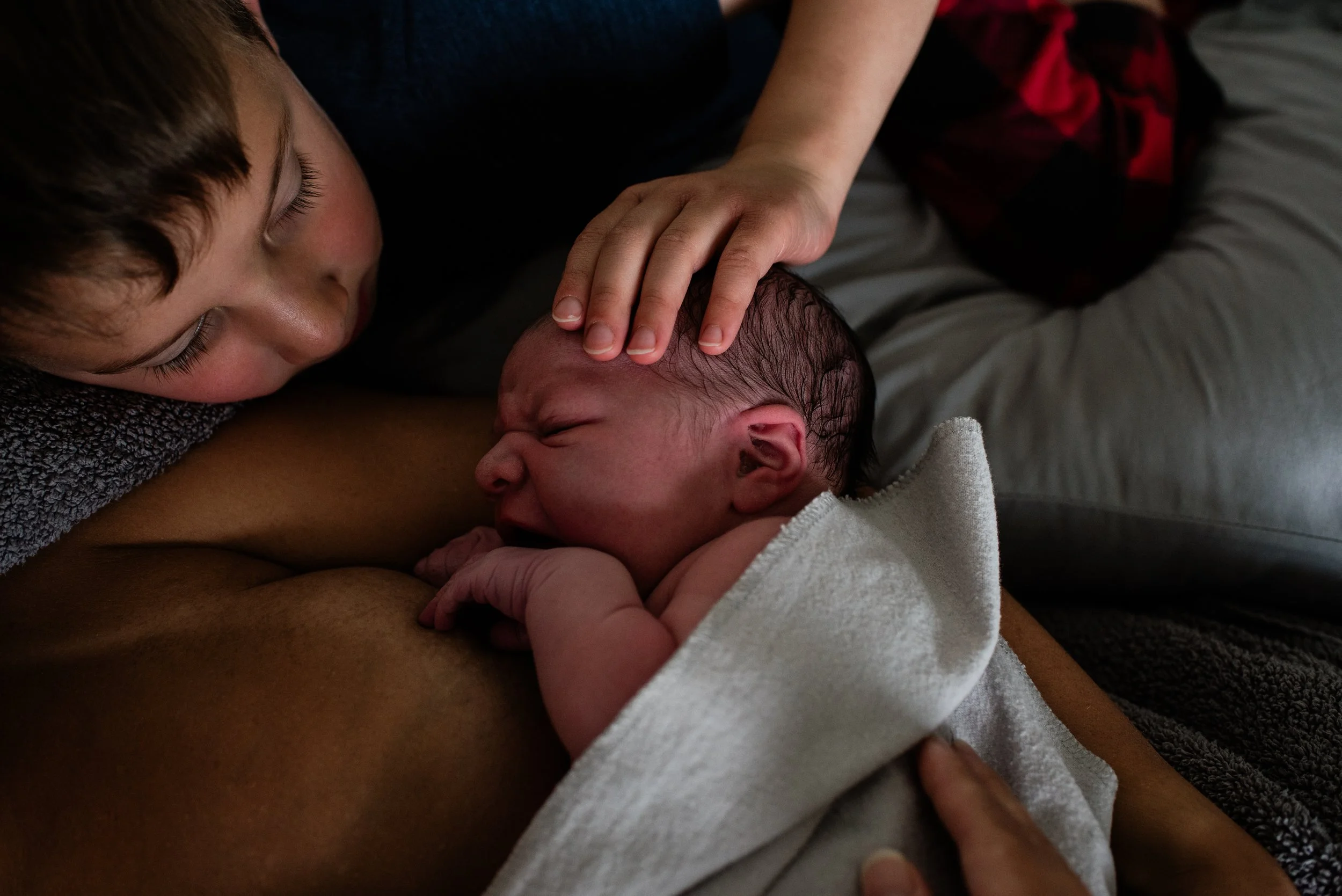 Born at Home With Trillium Midwives in Maple Grove, Minnesota | A Full Gallery of a Peaceful Water Birth in Photographs