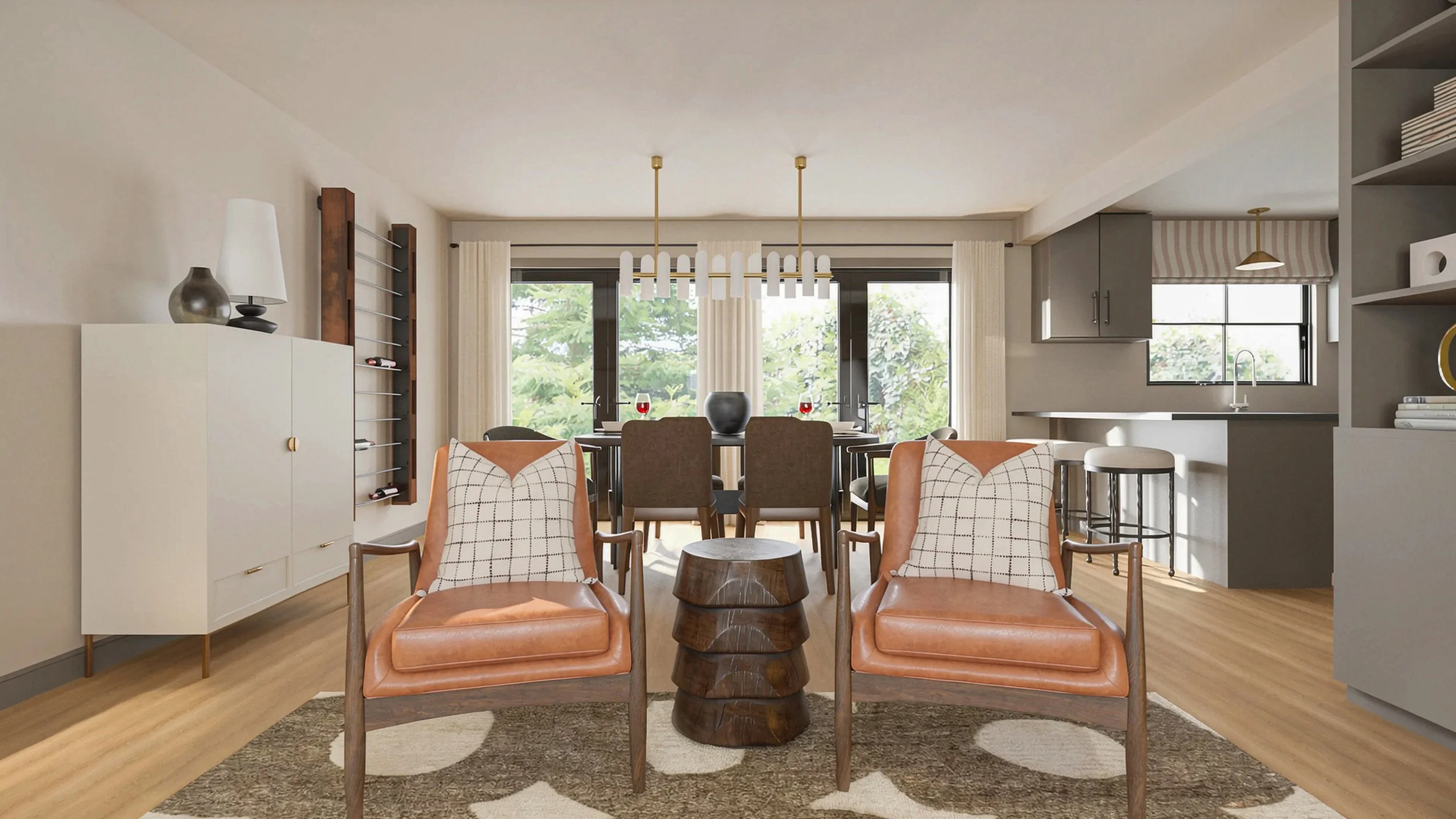 twin leather accent chairs opening into the kitchen and dining spaces