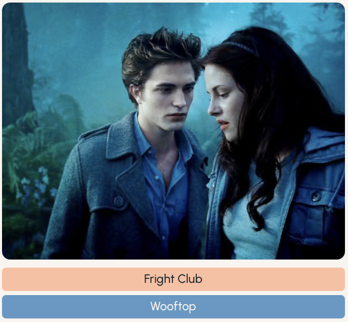 Screenshot from Twilight with Edward looking at Bella in the woods.