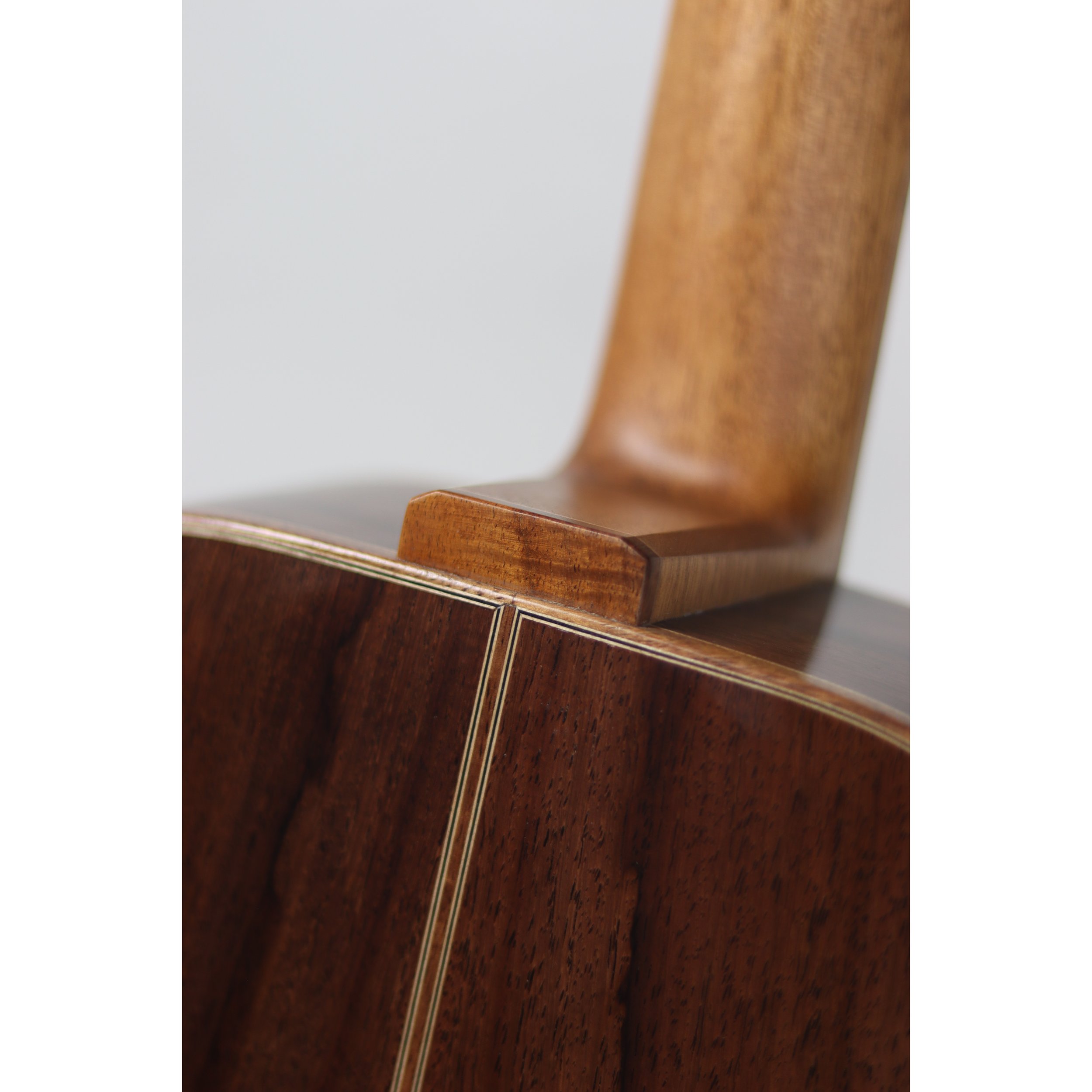 Geoffrey Yenson nylon-string parlor guitar: old-growth redwood, Honduras rosewood, and koa