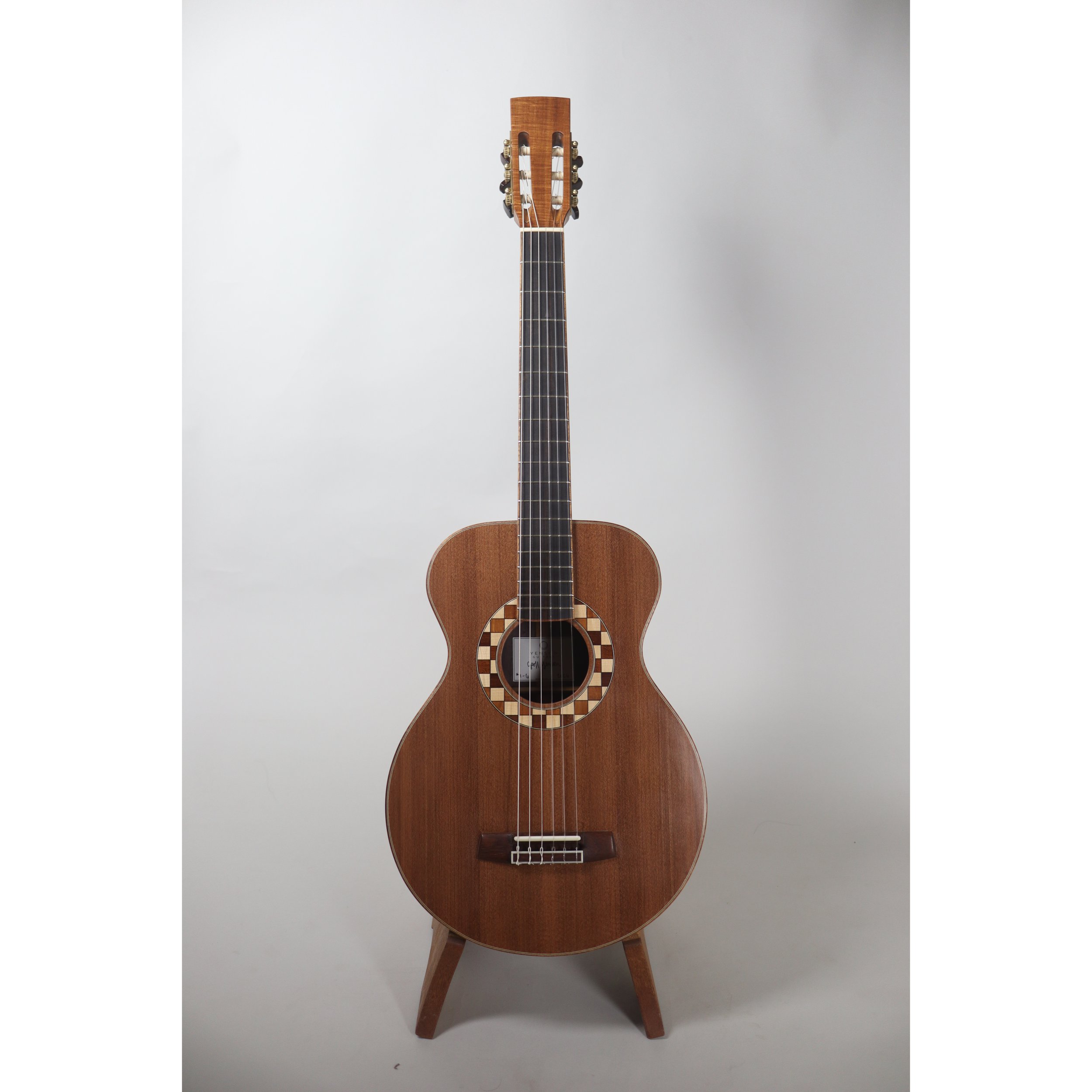 Geoffrey Yenson nylon-string parlor guitar: old-growth redwood, Honduras rosewood, and koa
