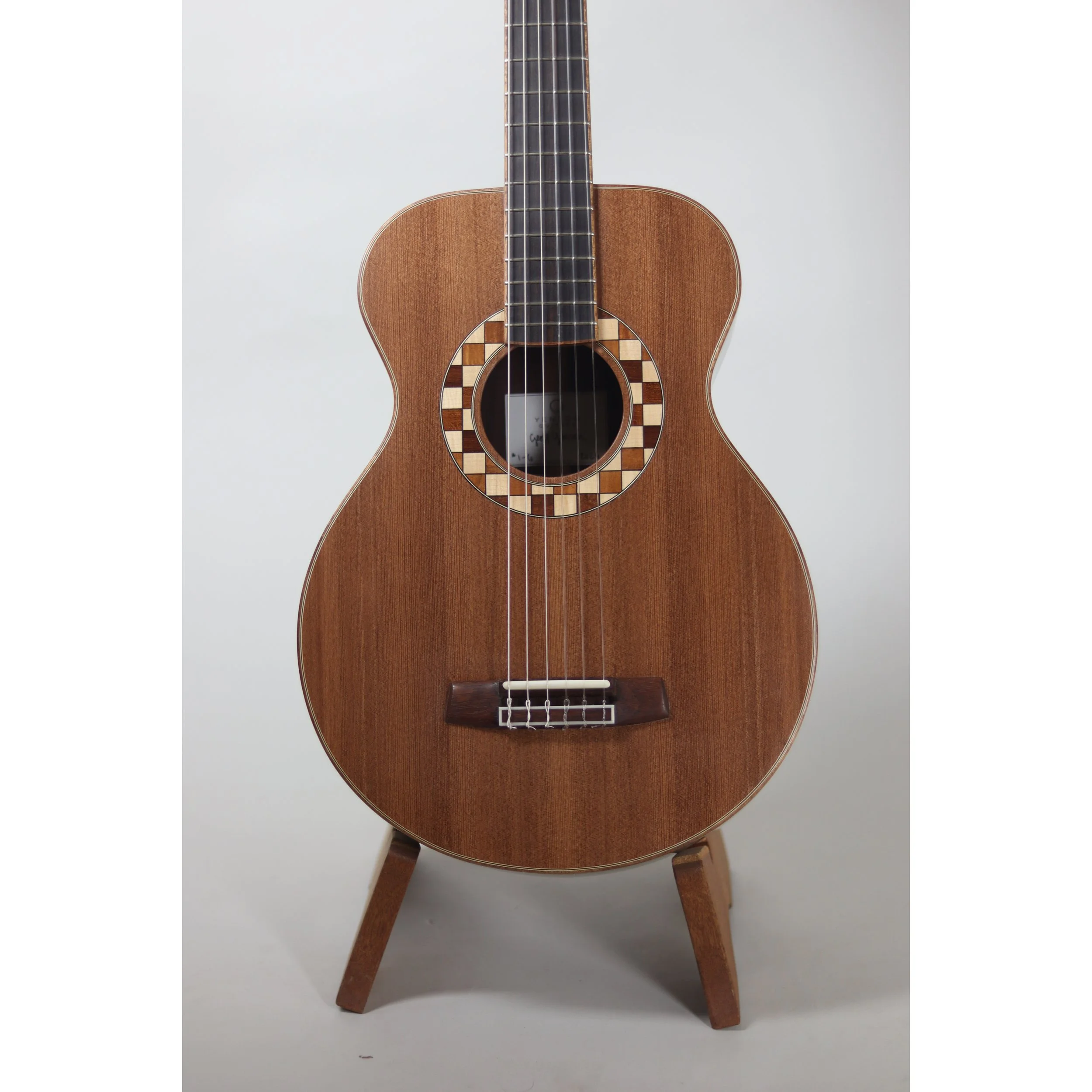 Geoffrey Yenson nylon-string parlor guitar: old-growth redwood, Honduras rosewood, and koa