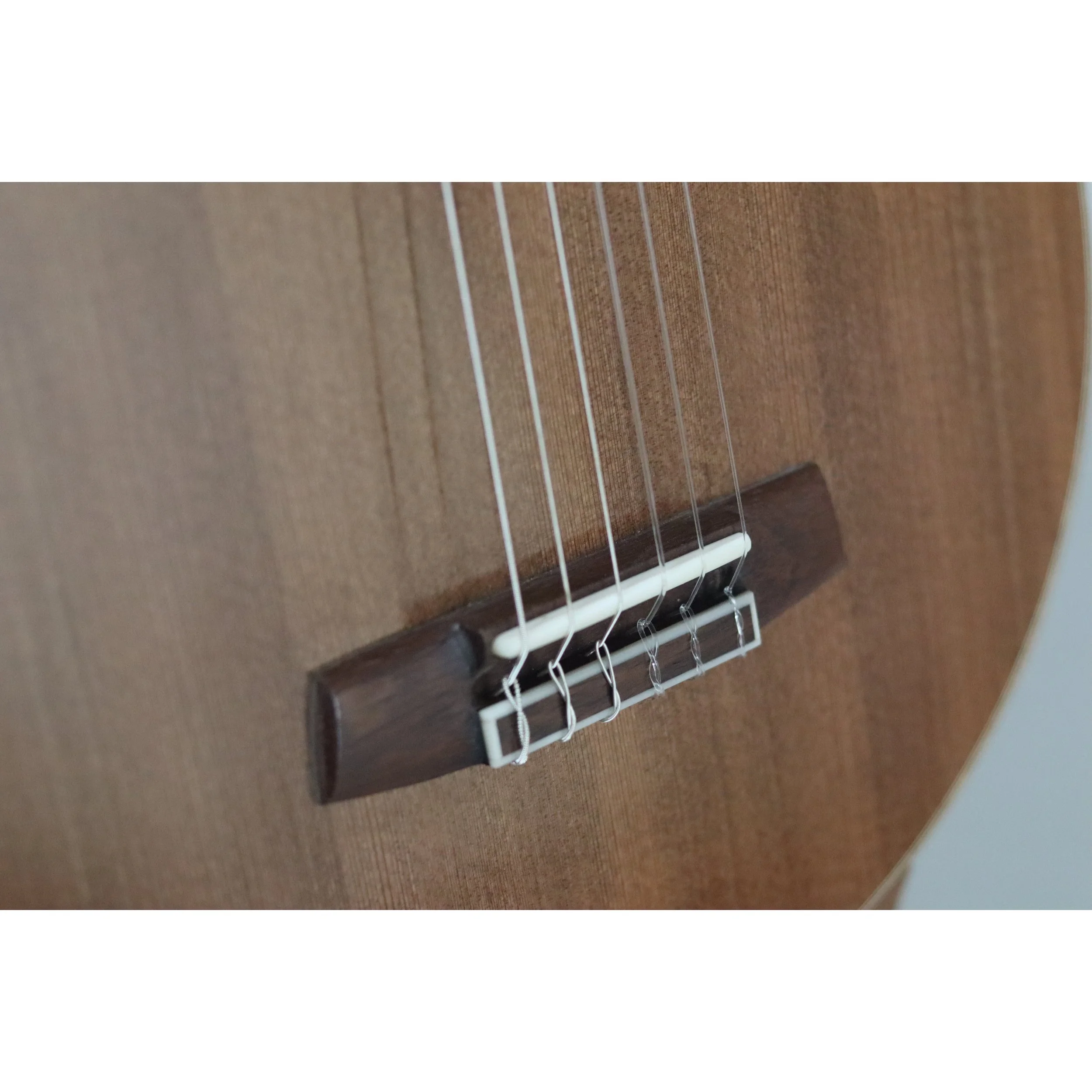 Geoffrey Yenson nylon-string parlor guitar: old-growth redwood, Honduras rosewood, and koa
